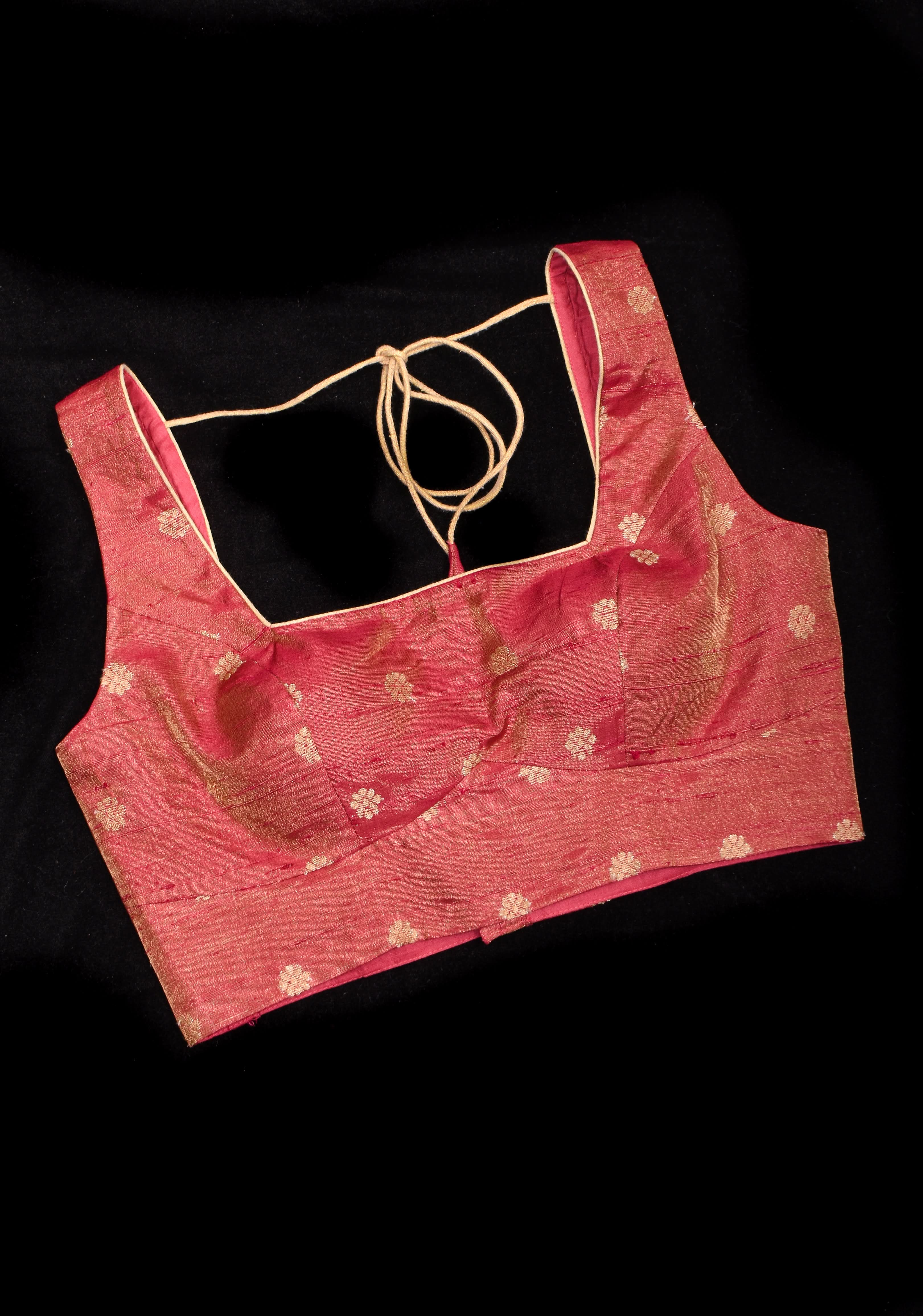 Deep Square Neck Sleeveless blouse in Reddish pink Pure Tissue Raw silk with zari buttas | Shobitam