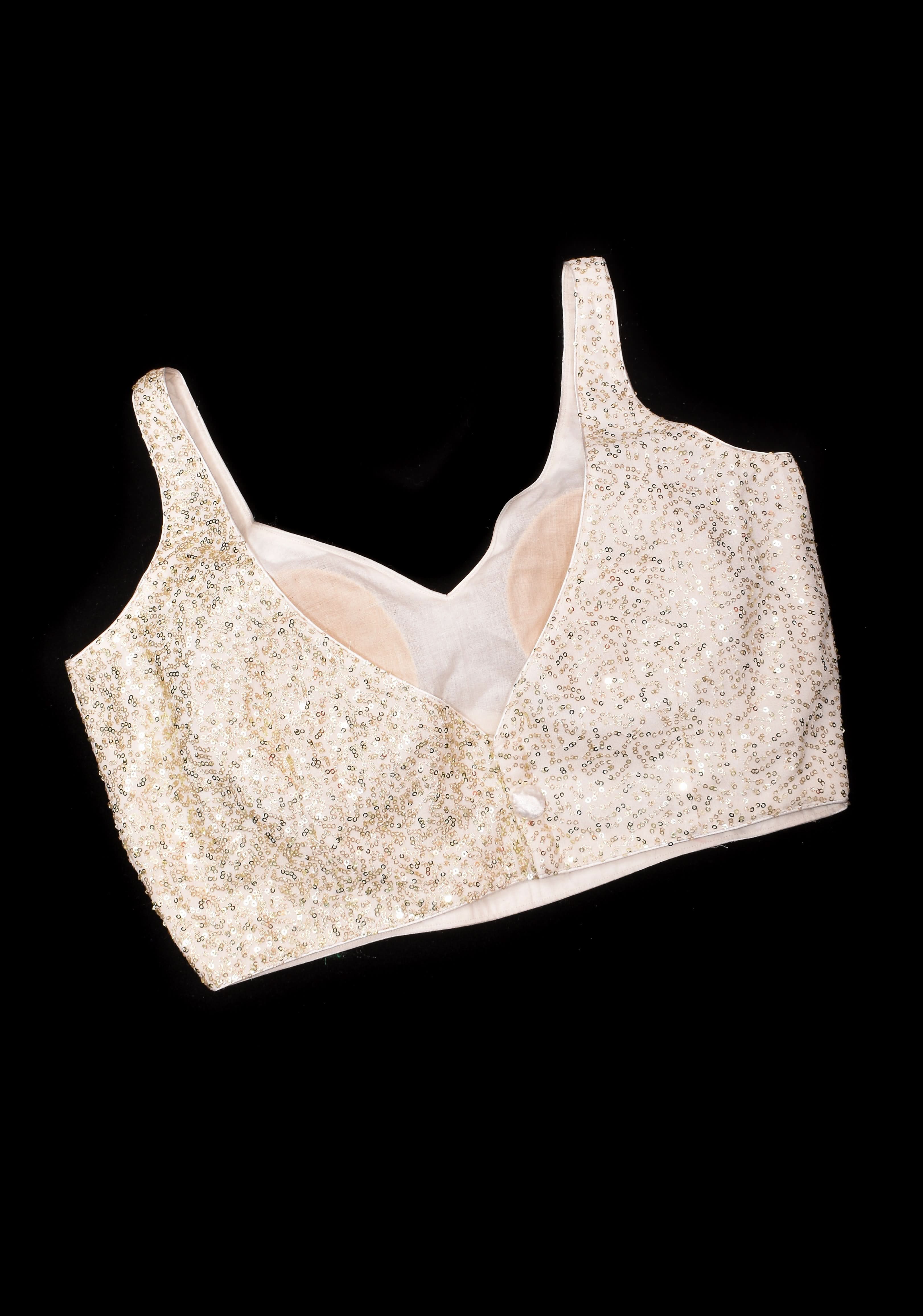 Dainty sequin on net sleeveless blouse with deep leaf neck, Made to Order | Shobitam
