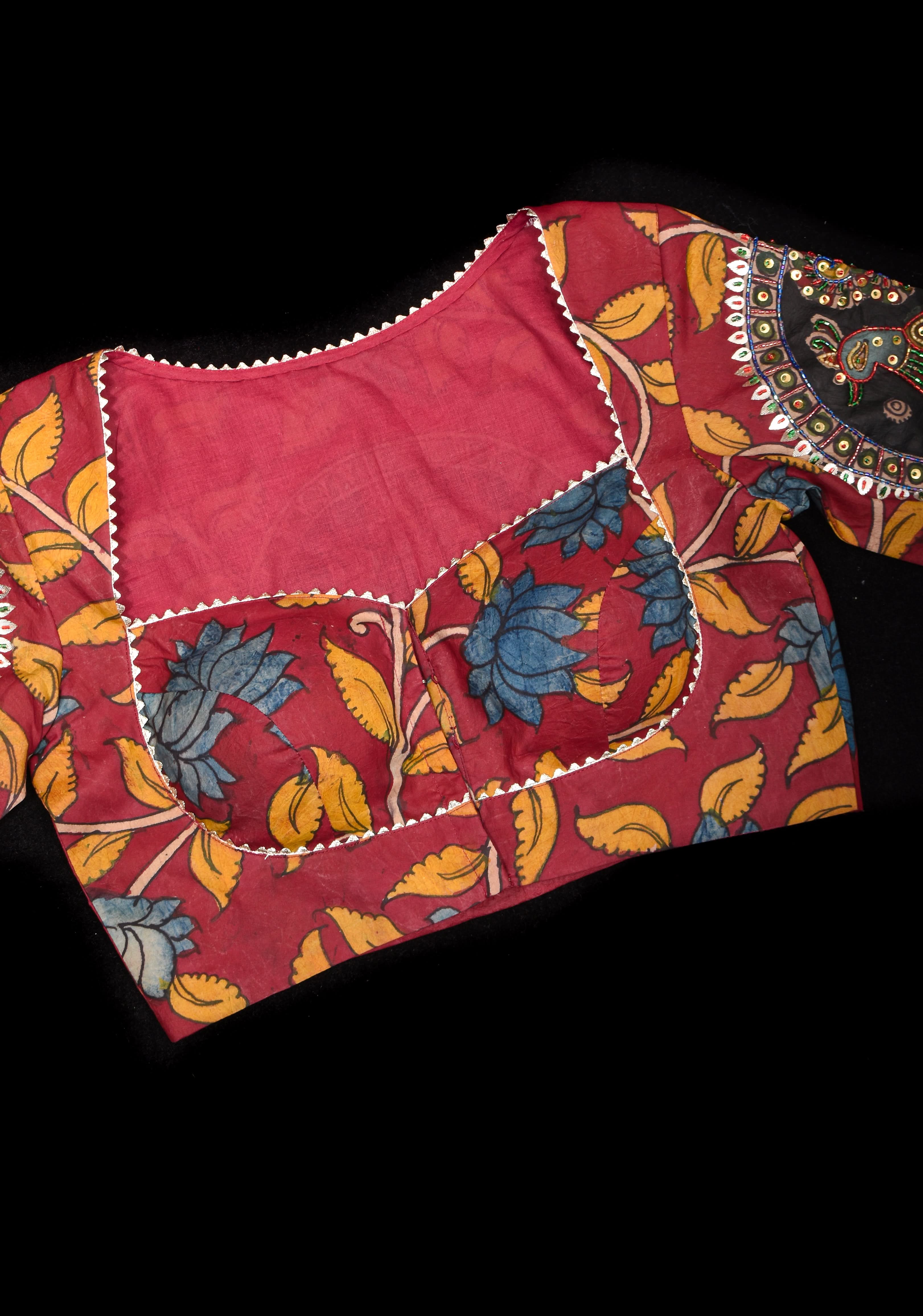 Red Kalamkari blouse with peacock designs, and cutdana, gotta and sequins handwork | Shobitam