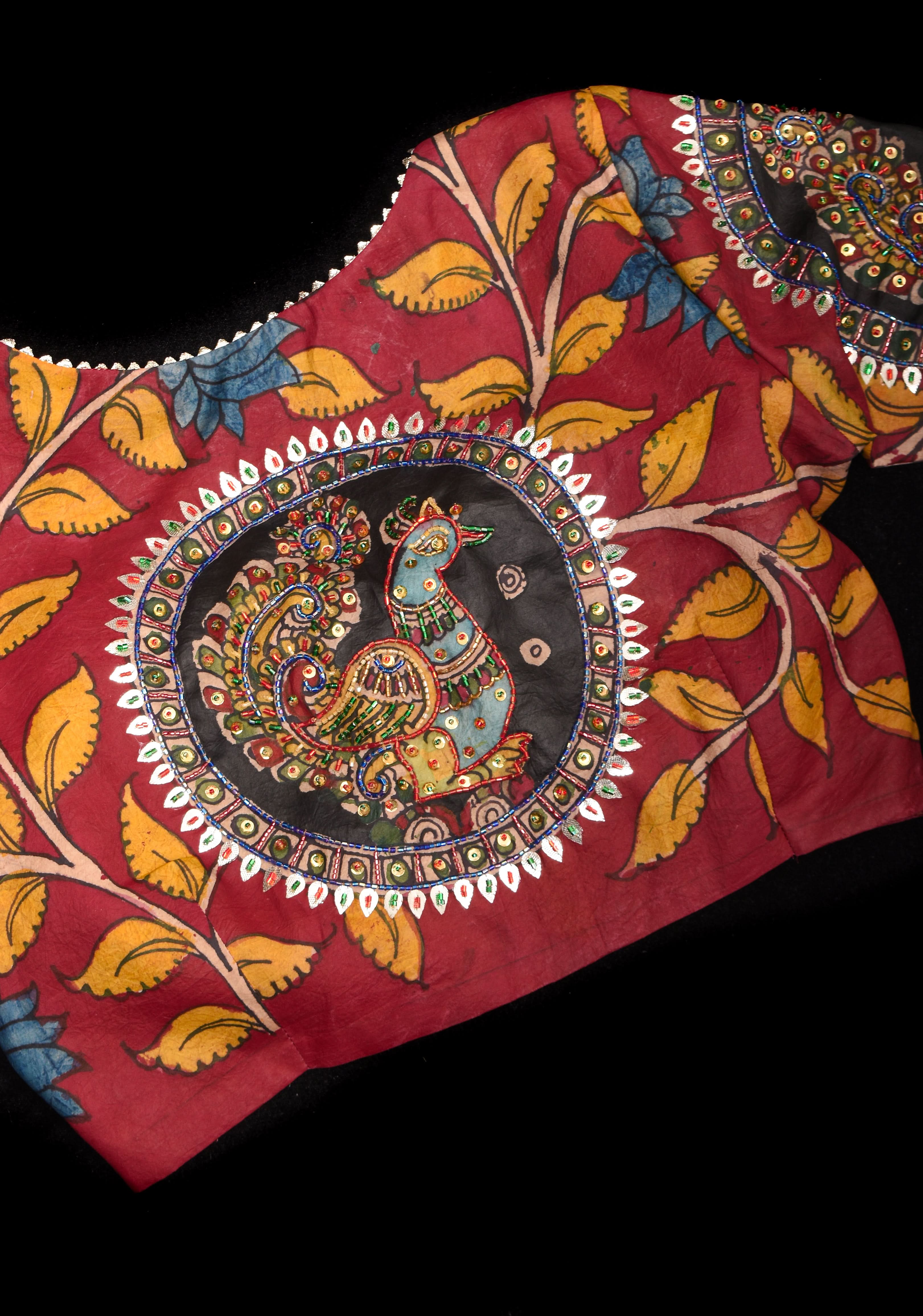 Red Kalamkari blouse with peacock designs, and cutdana, gotta and sequins handwork | Shobitam