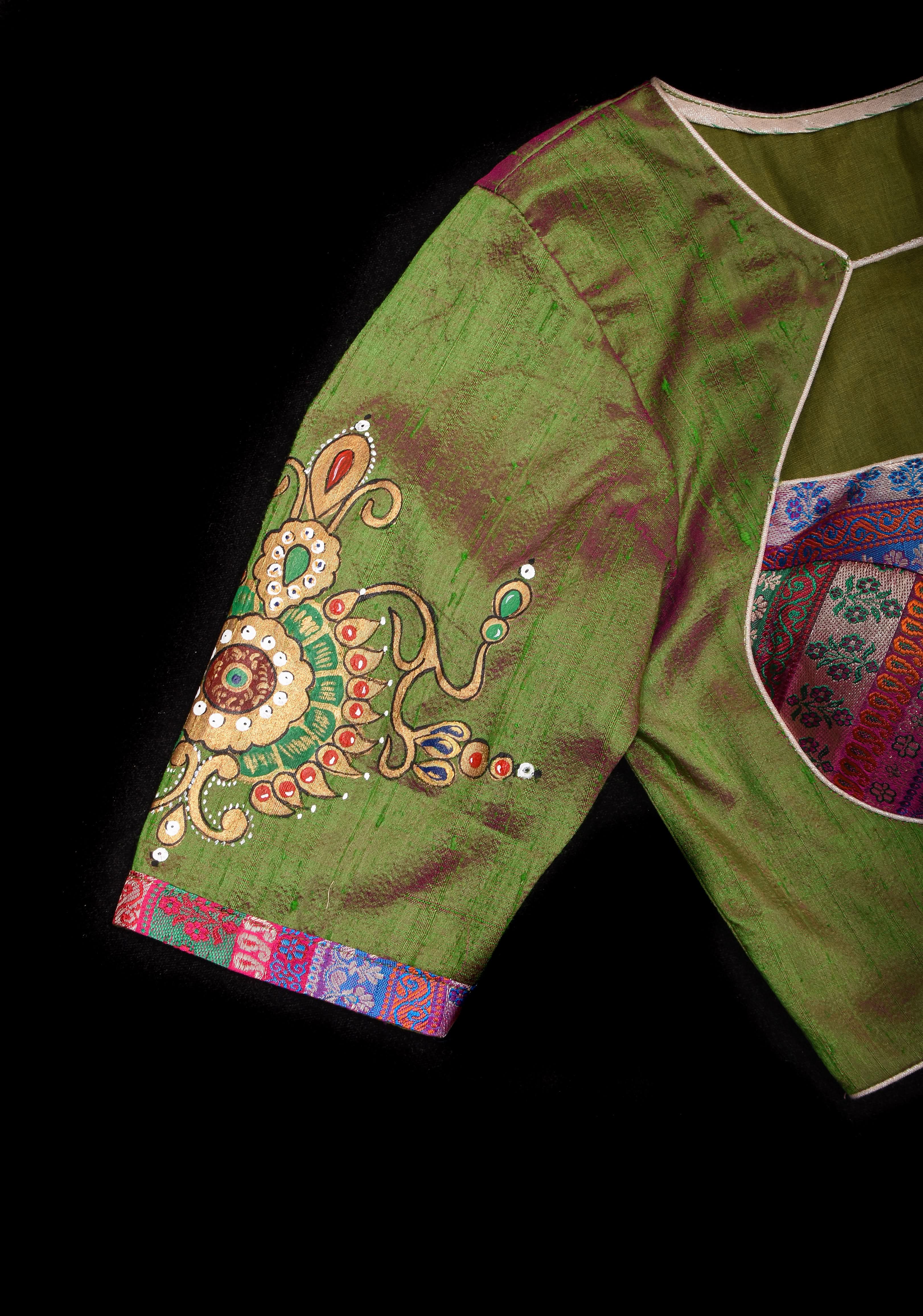 Nizam Jewelry Handpainted Blouse in Green pink Pure Raw silk with multicolor brocade bustier detailing | Shobitam