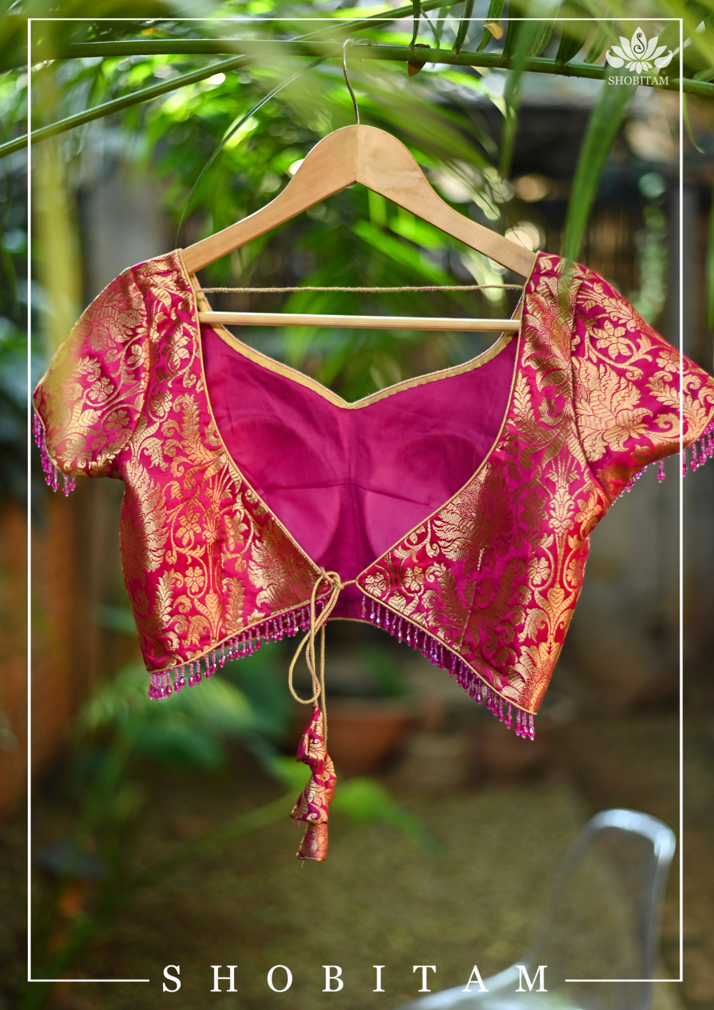 Rani Pink Banarasi Brocade Blouse with Back tie design and dangling beads | Shobitam