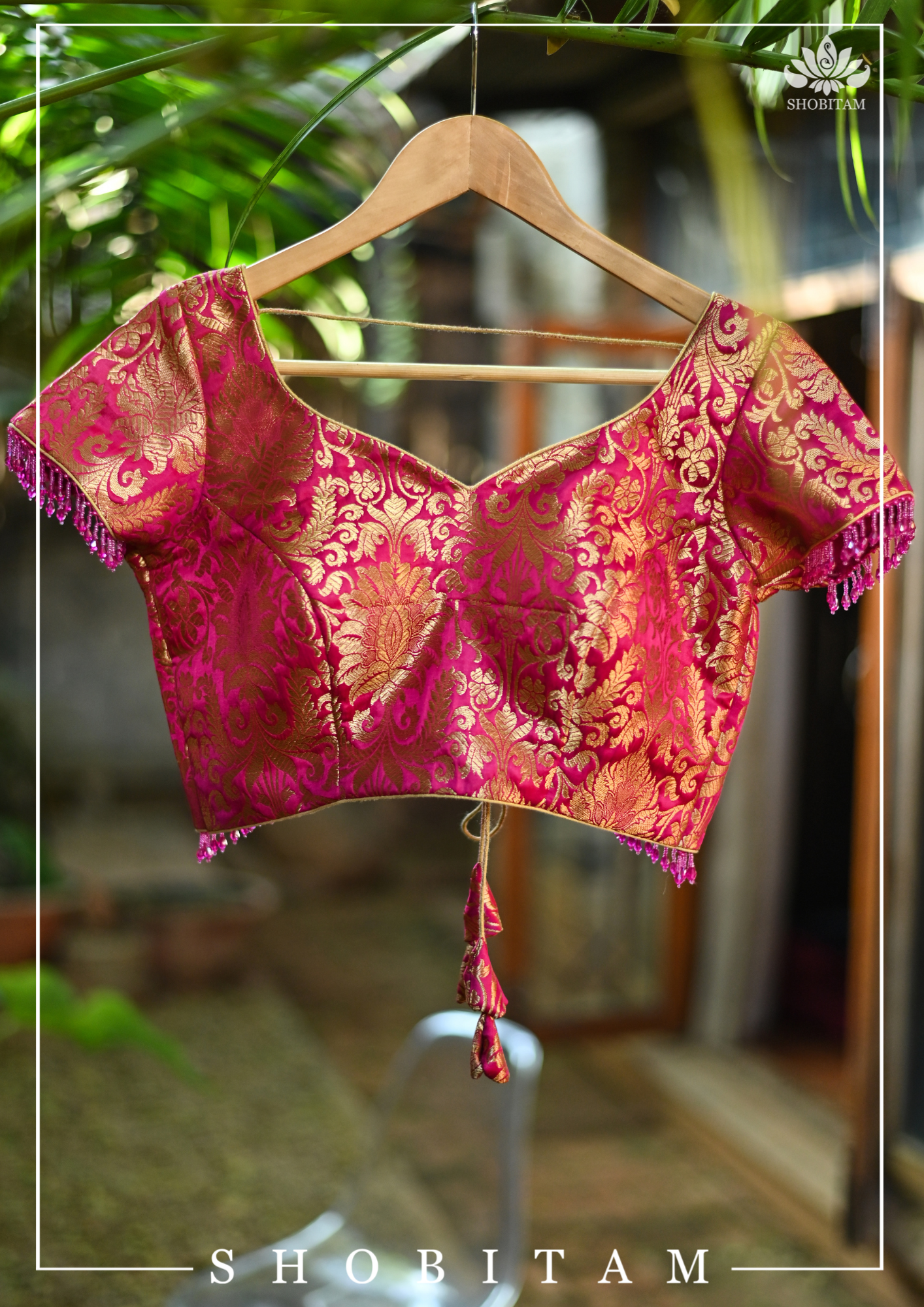Rani Pink Banarasi Brocade Blouse with Back tie design and dangling beads | Shobitam