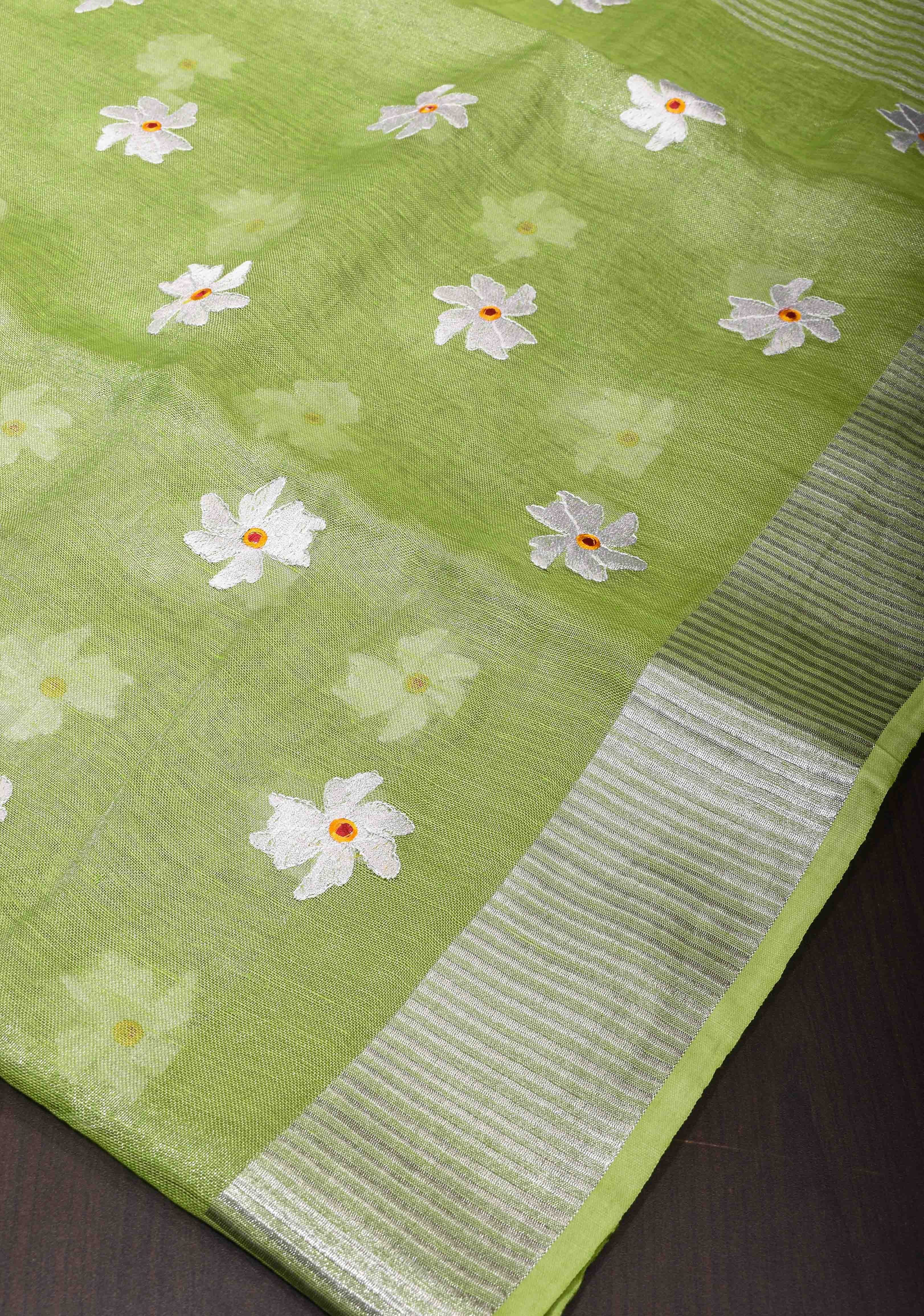 Parrot Green Linen Saree with Parijaat Flower Embroidery | Shobitam saree