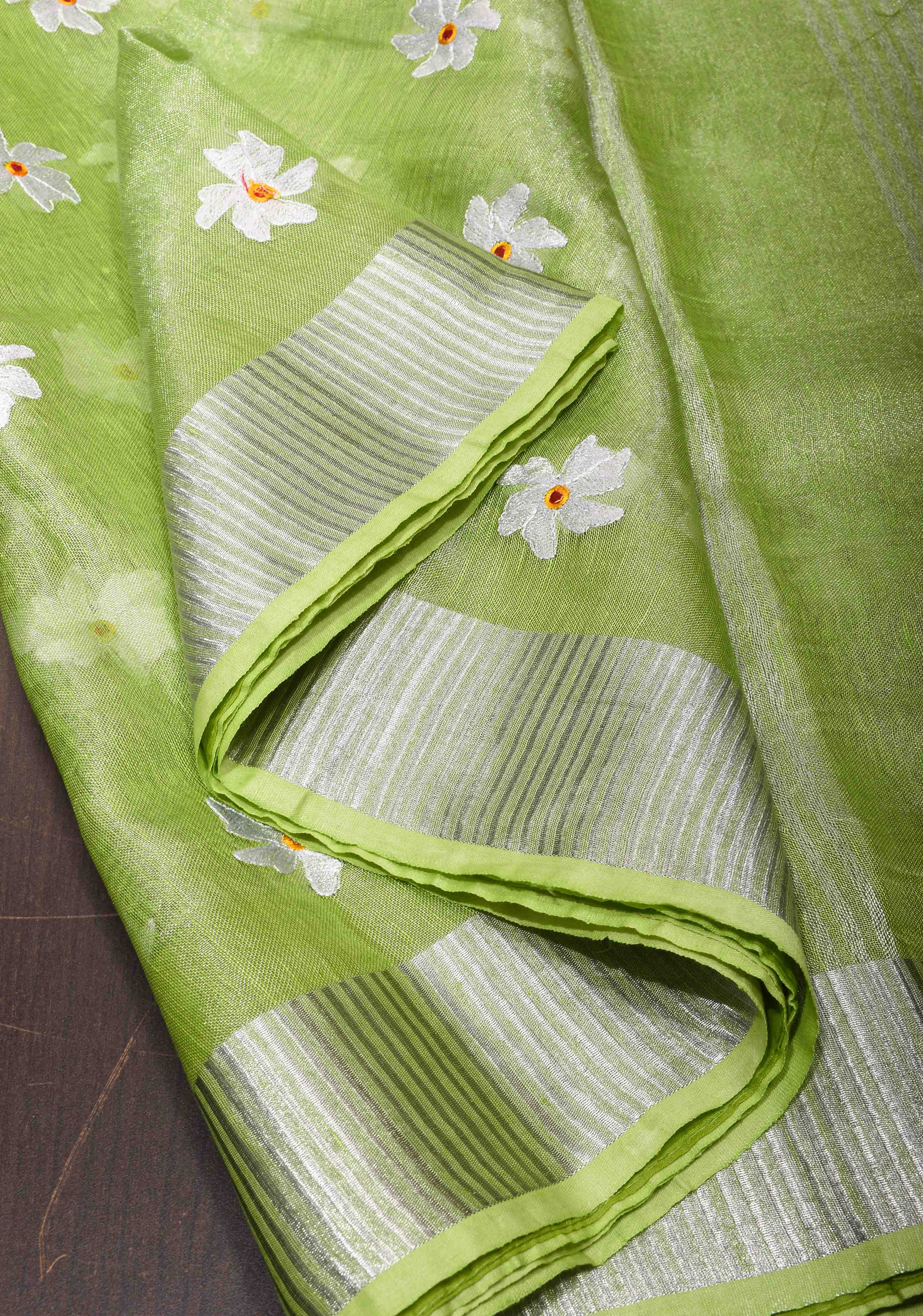 Parrot Green Linen Saree with Parijaat Flower Embroidery | Shobitam saree