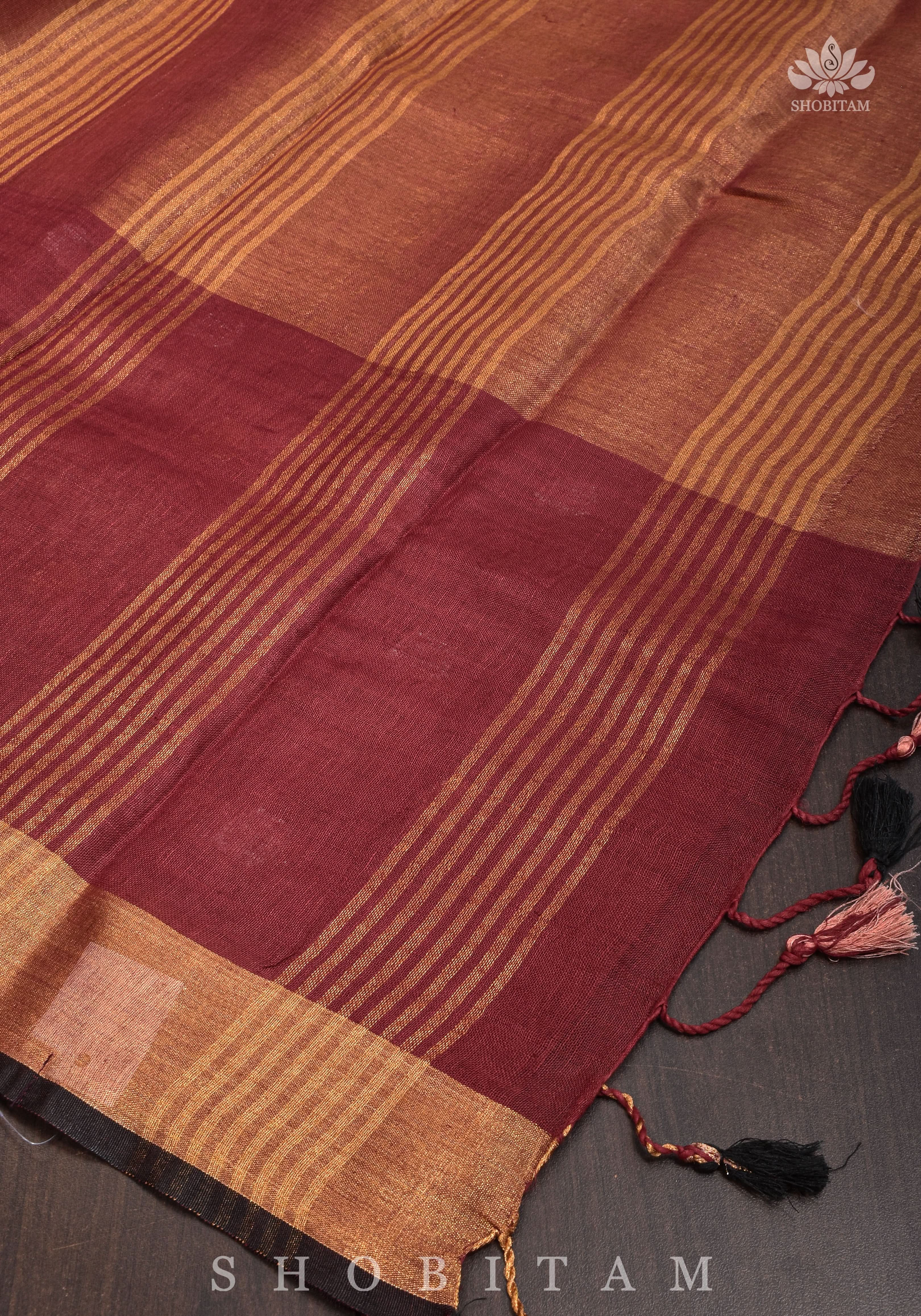 Maroon Tissue Body Linen Saree in Muted Antique Gold with Sona Rupa Polka Dots Skirt Border | Shobitam