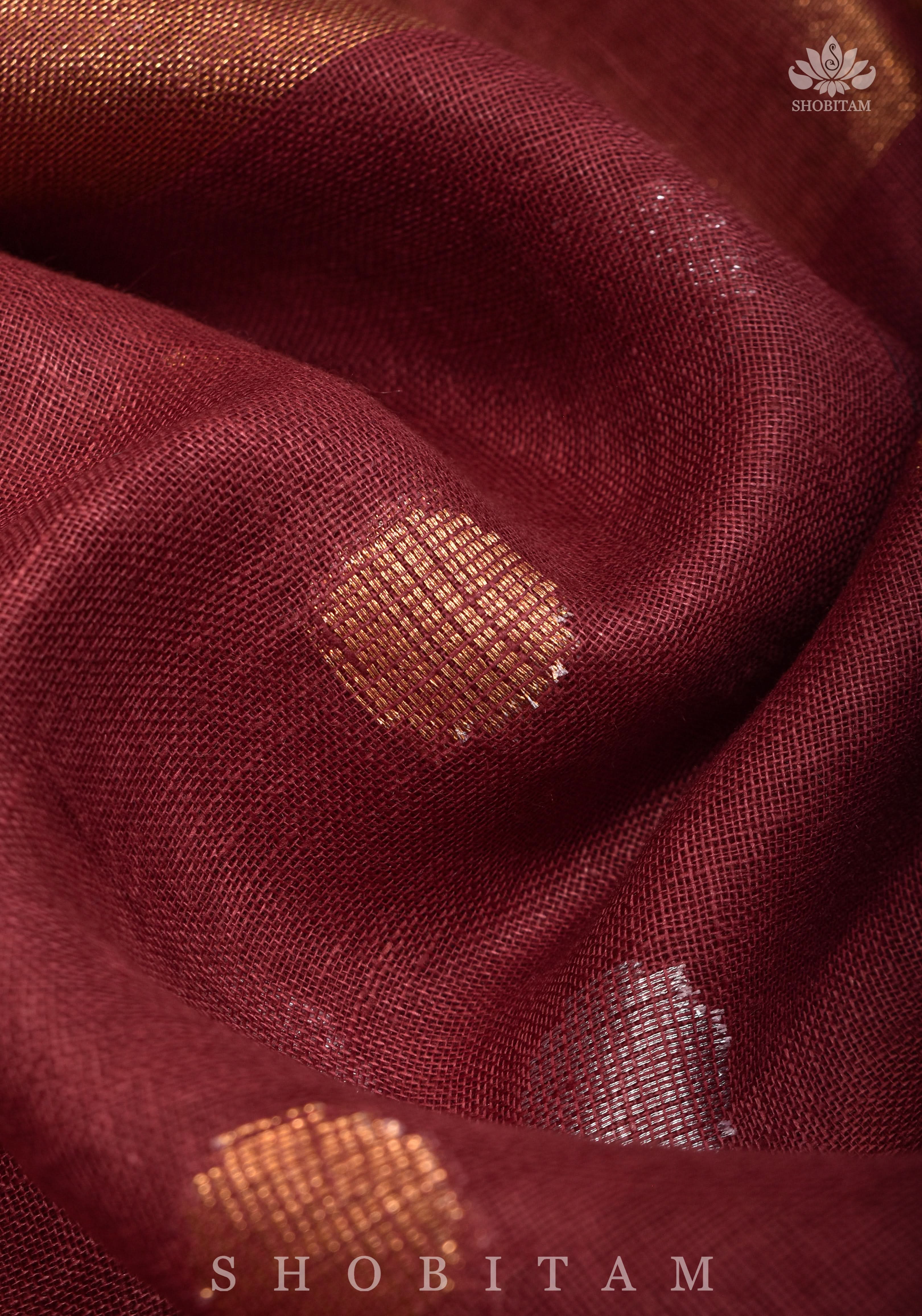 Maroon Tissue Body Linen Saree in Muted Antique Gold with Sona Rupa Polka Dots Skirt Border | Shobitam
