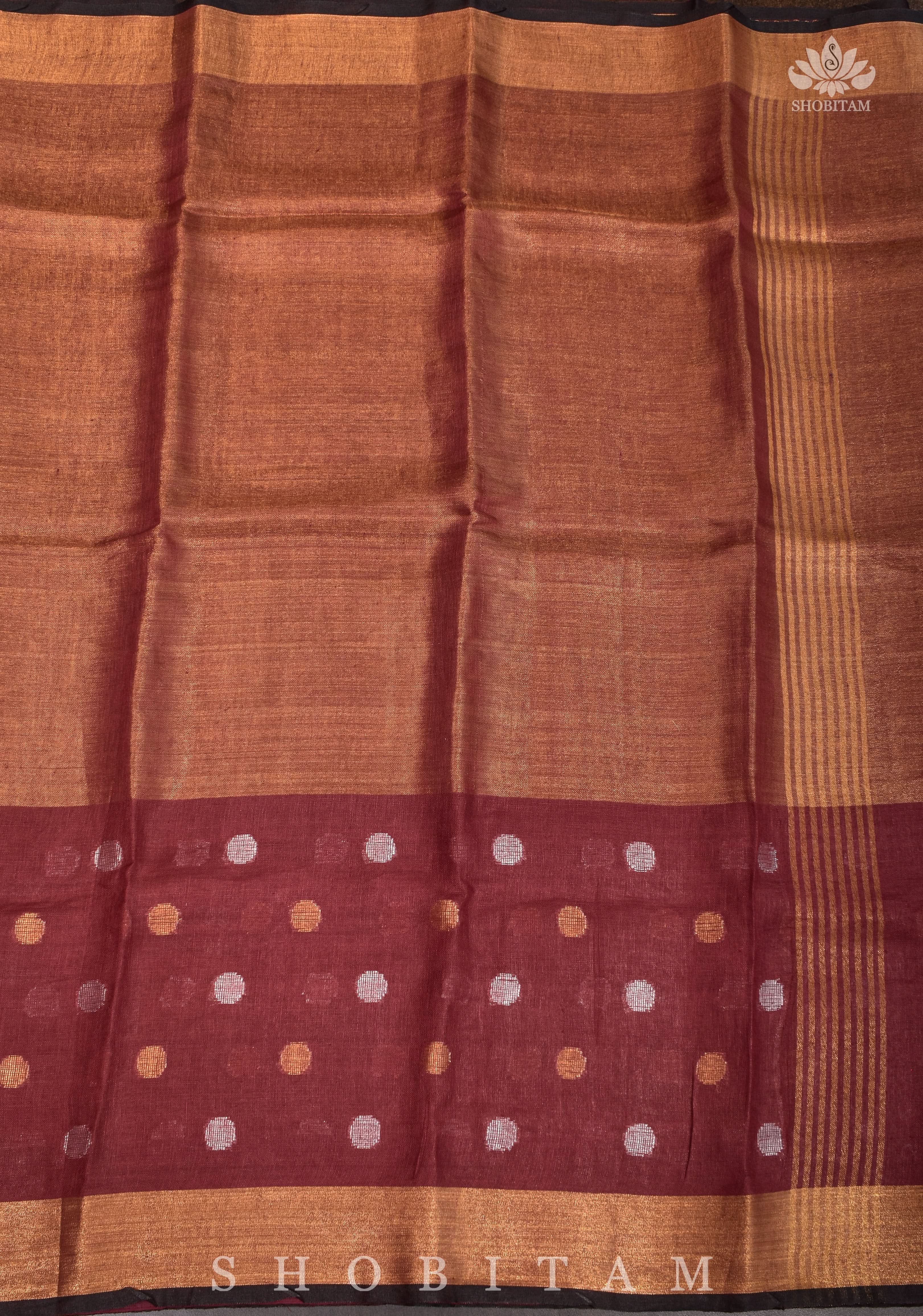 Maroon Tissue Body Linen Saree in Muted Antique Gold with Sona Rupa Polka Dots Skirt Border | Shobitam