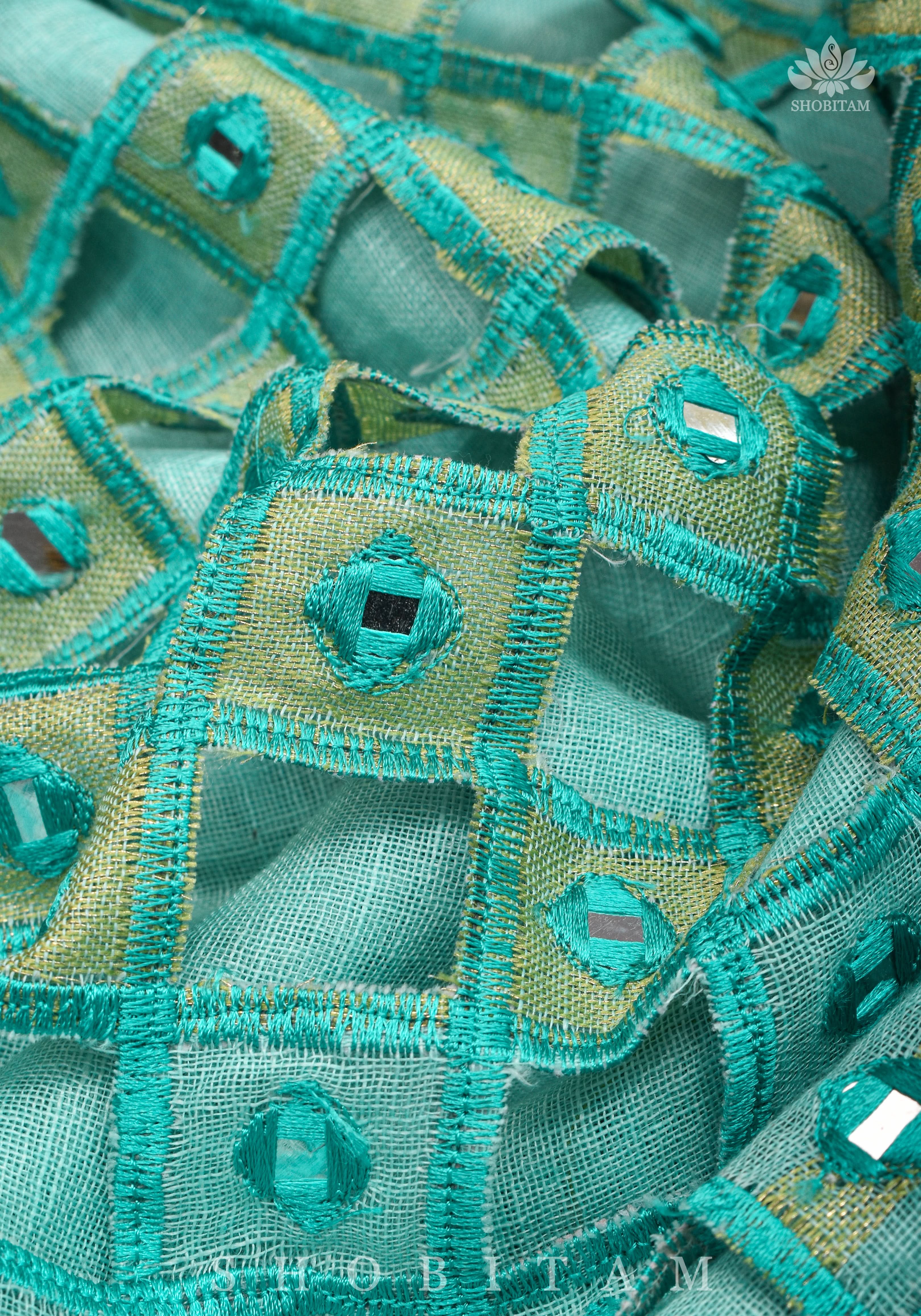Jaali Pallu - Cutwork and Mirrorwork Saree in Linen by Linen in Teal Color | Shobitam