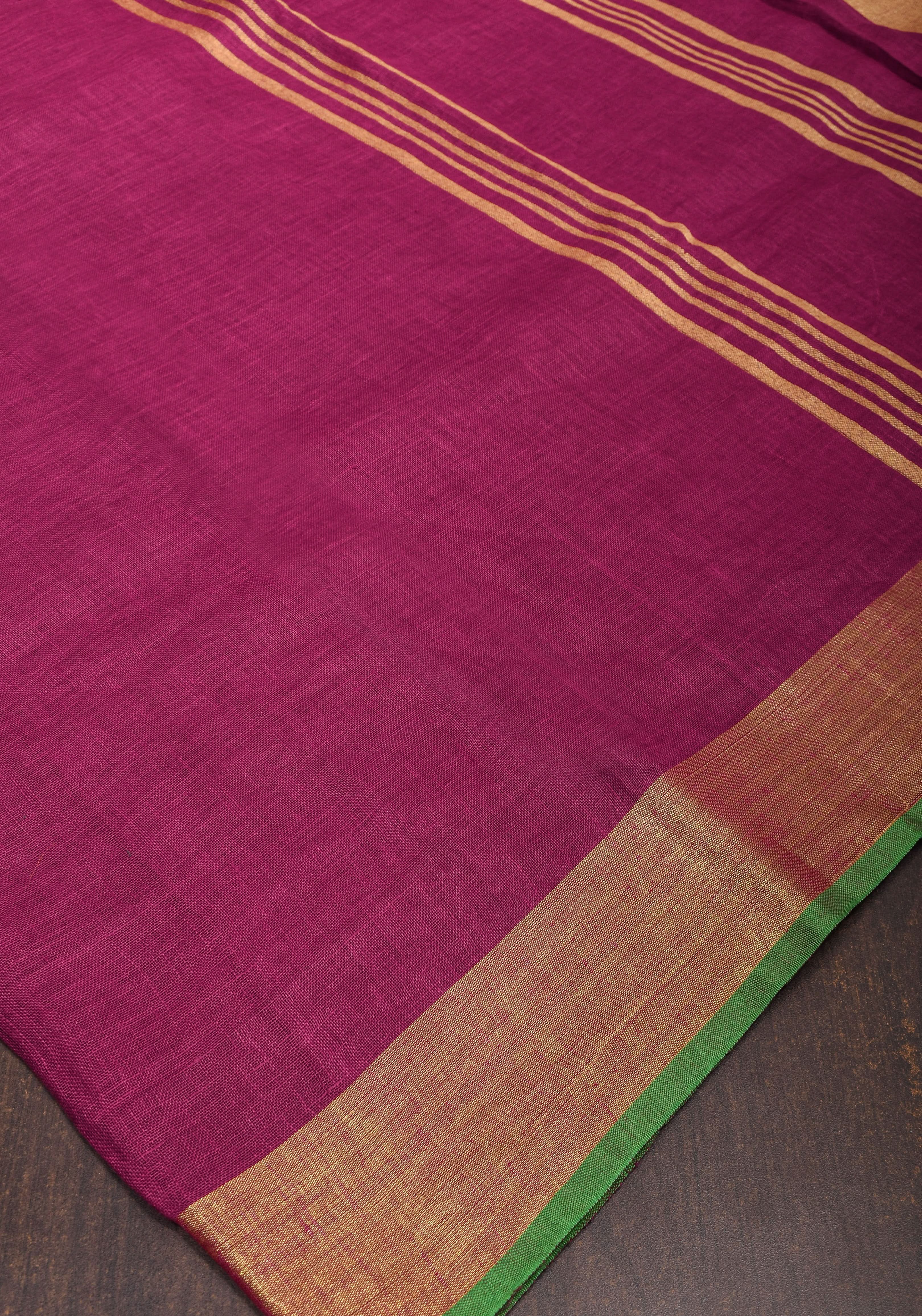 Magenta Pink and Green Linen Saree with Gold Zari Border and Green Selvedge | Shobitam