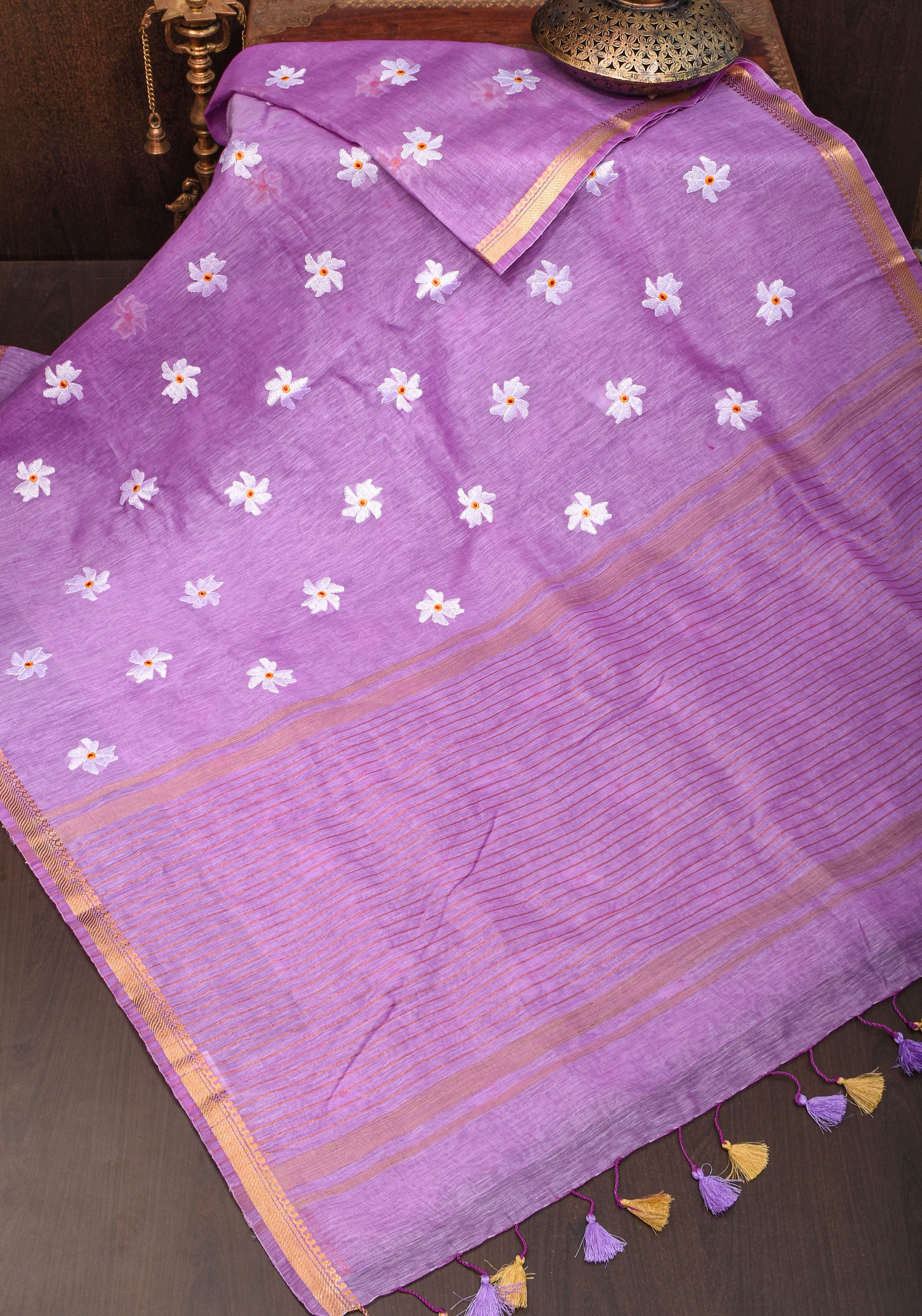 Lavender Tone silk linen saree with white Parijaat Floral embroidery and Zari Border | Shobitam