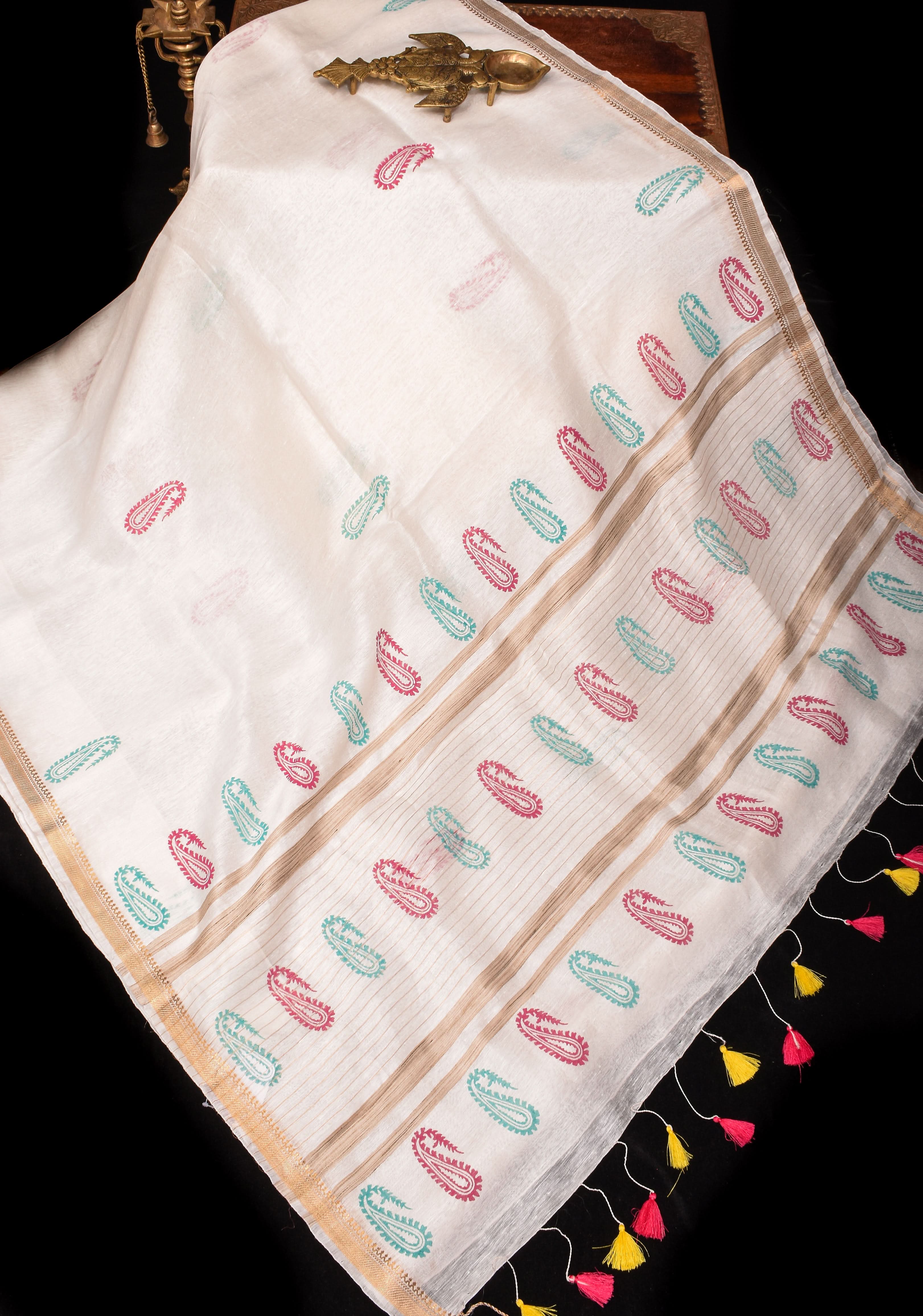 White Silk Linen Saree with Sanganeri Block Print Paisley buttas and Woven Zari Borders | Shobitam
