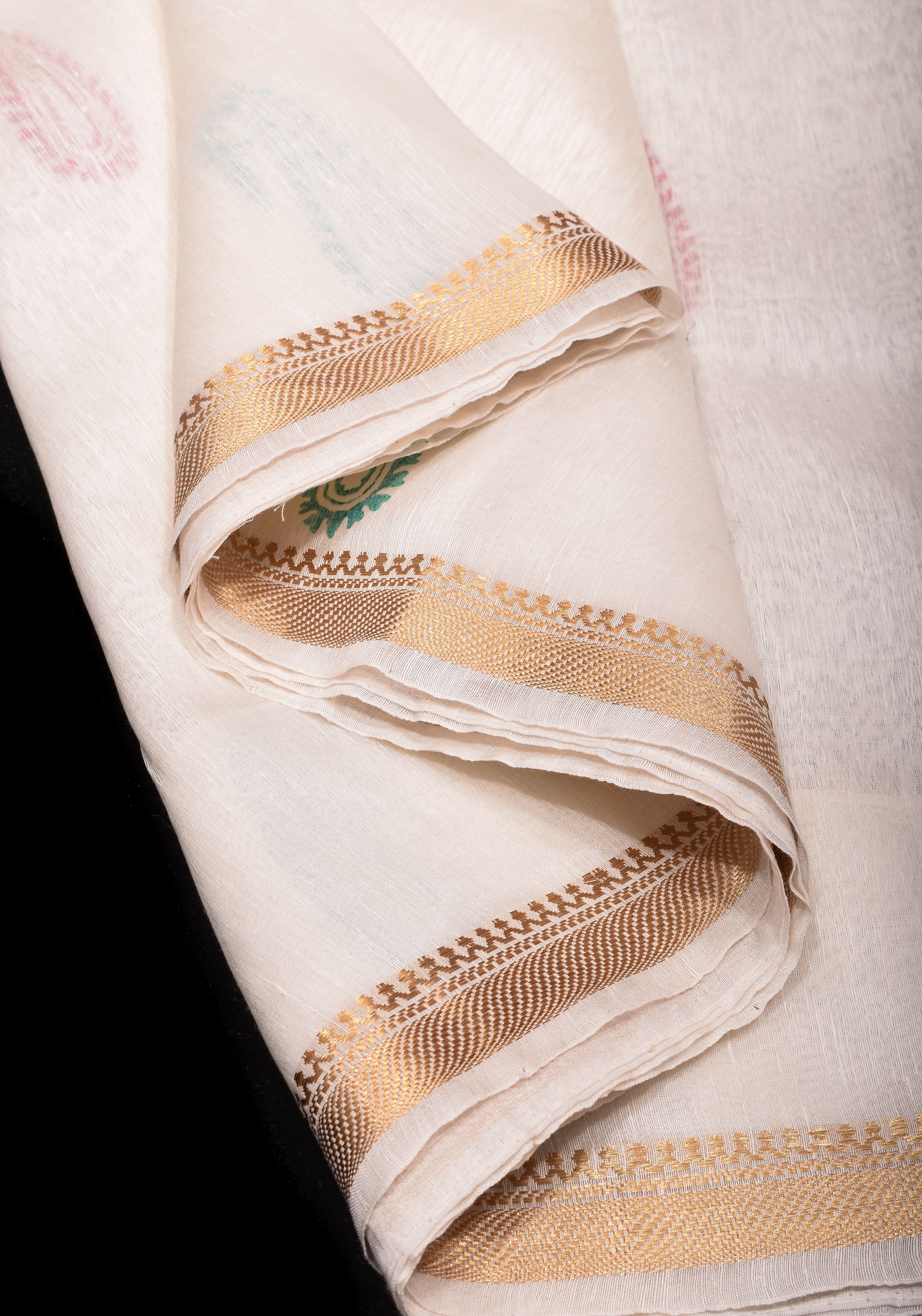 White Silk Linen Saree with Sanganeri Block Print Paisley buttas and Woven Zari Borders | Shobitam