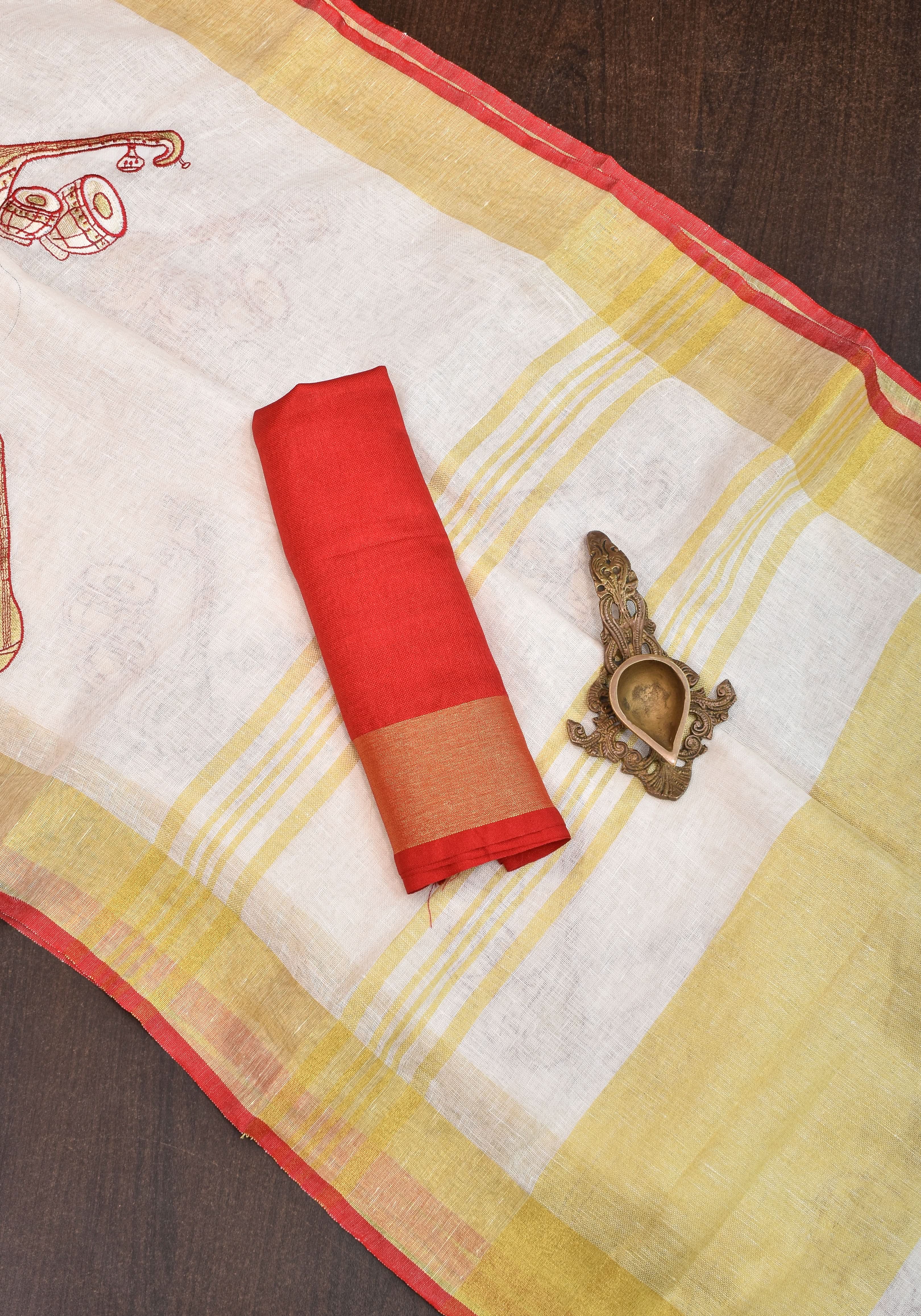 Linen by Linen Saree in White with Musical instruments embroidery motifs | Shobitam