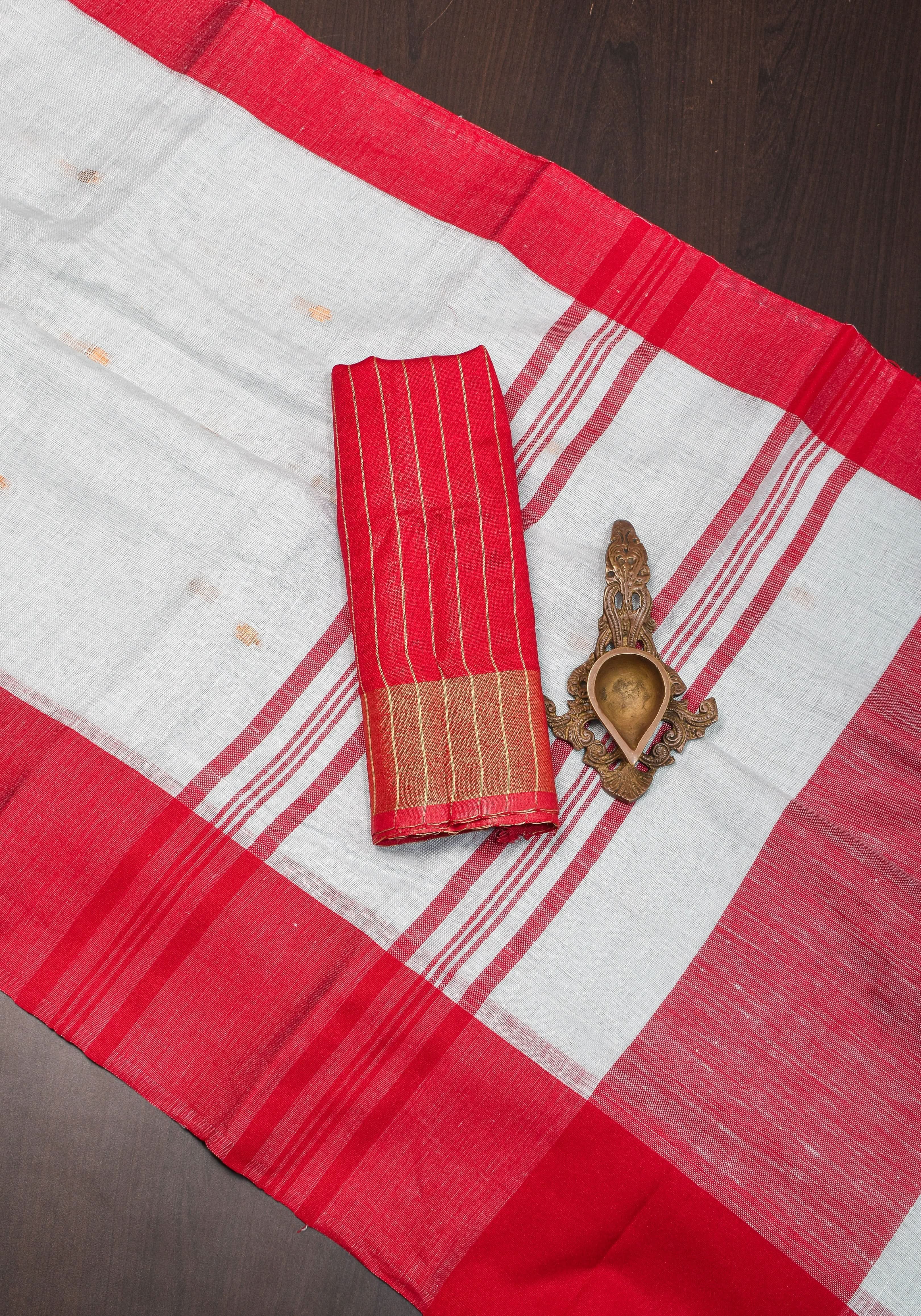 Off White and Red Linen by Linen Saree with thread Buttas | Shobitam
