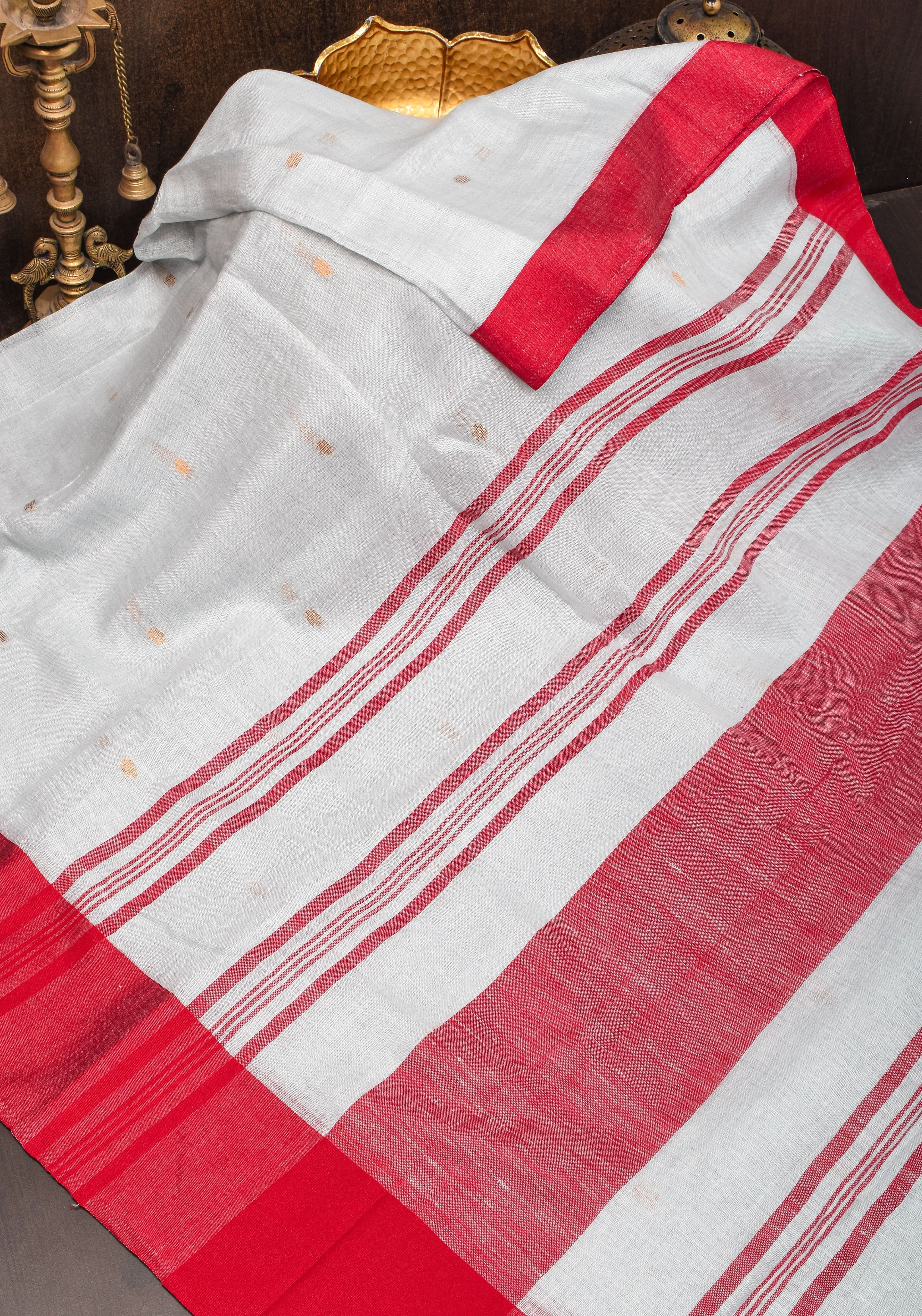 Off White and Red Linen by Linen Saree with thread Buttas | Shobitam