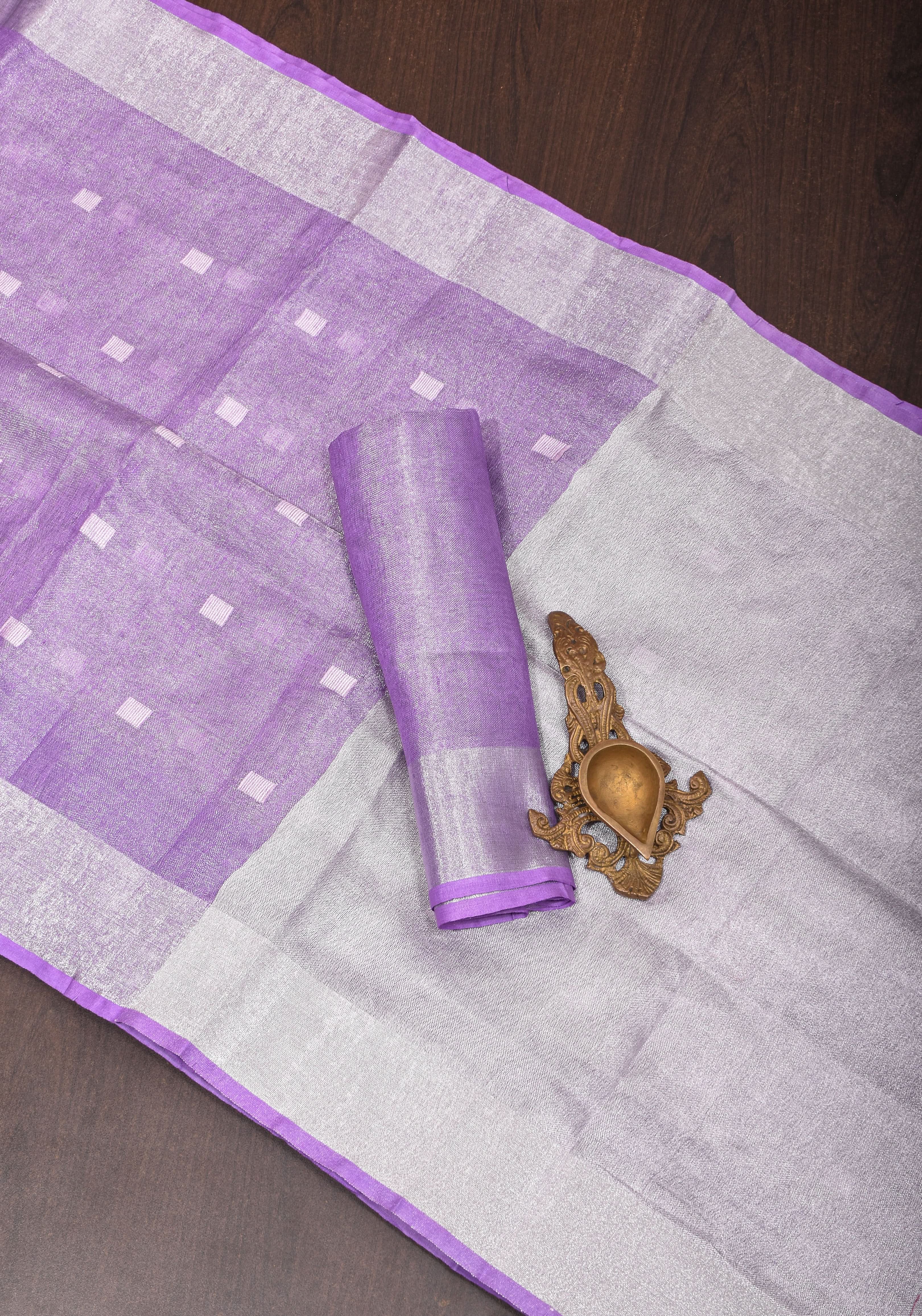 Lavender Hued Tissue Linen Saree with silver zari borders and long tassels! | Shobitam