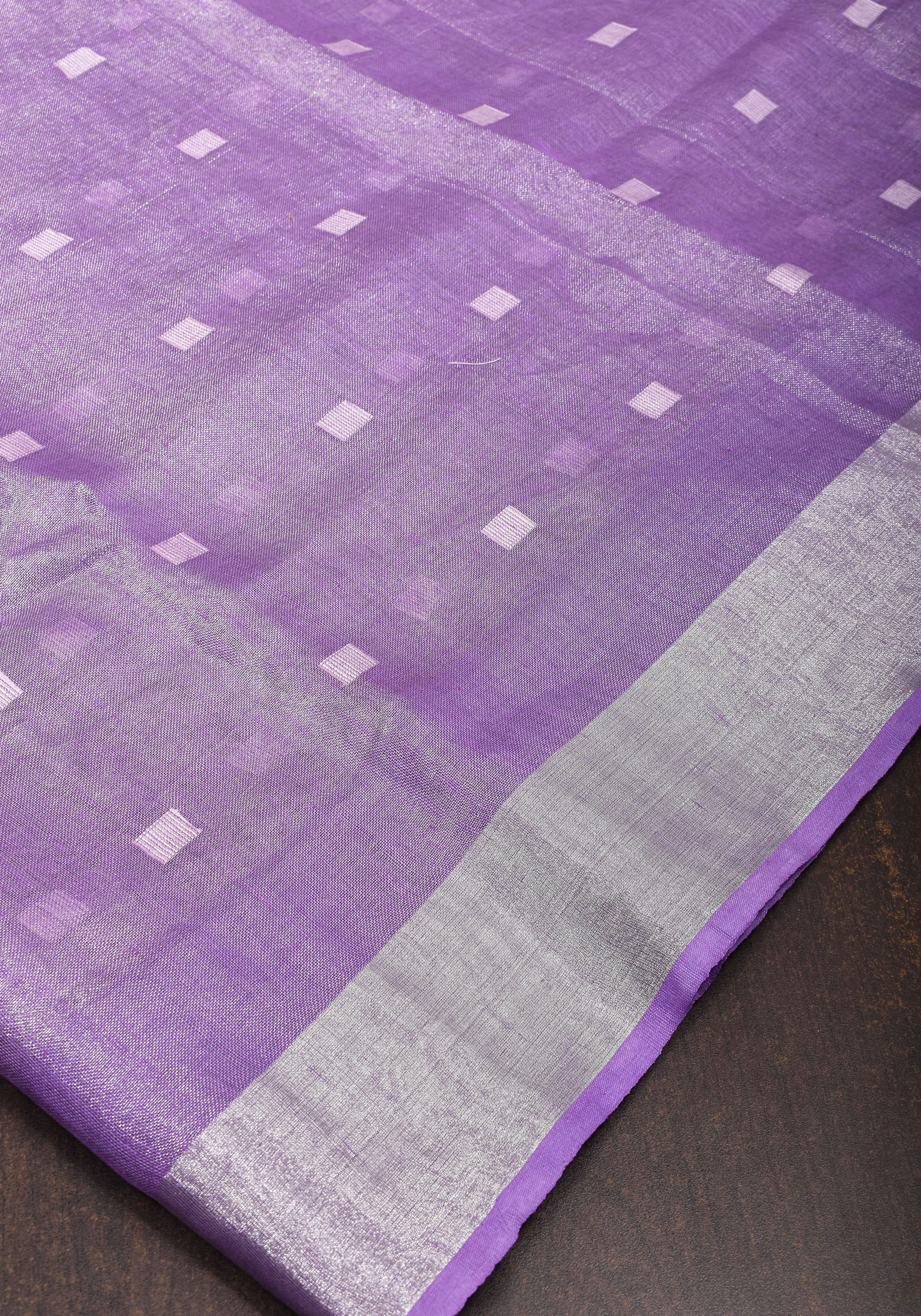 Lavender Hued Tissue Linen Saree with silver zari borders and long tassels! | Shobitam