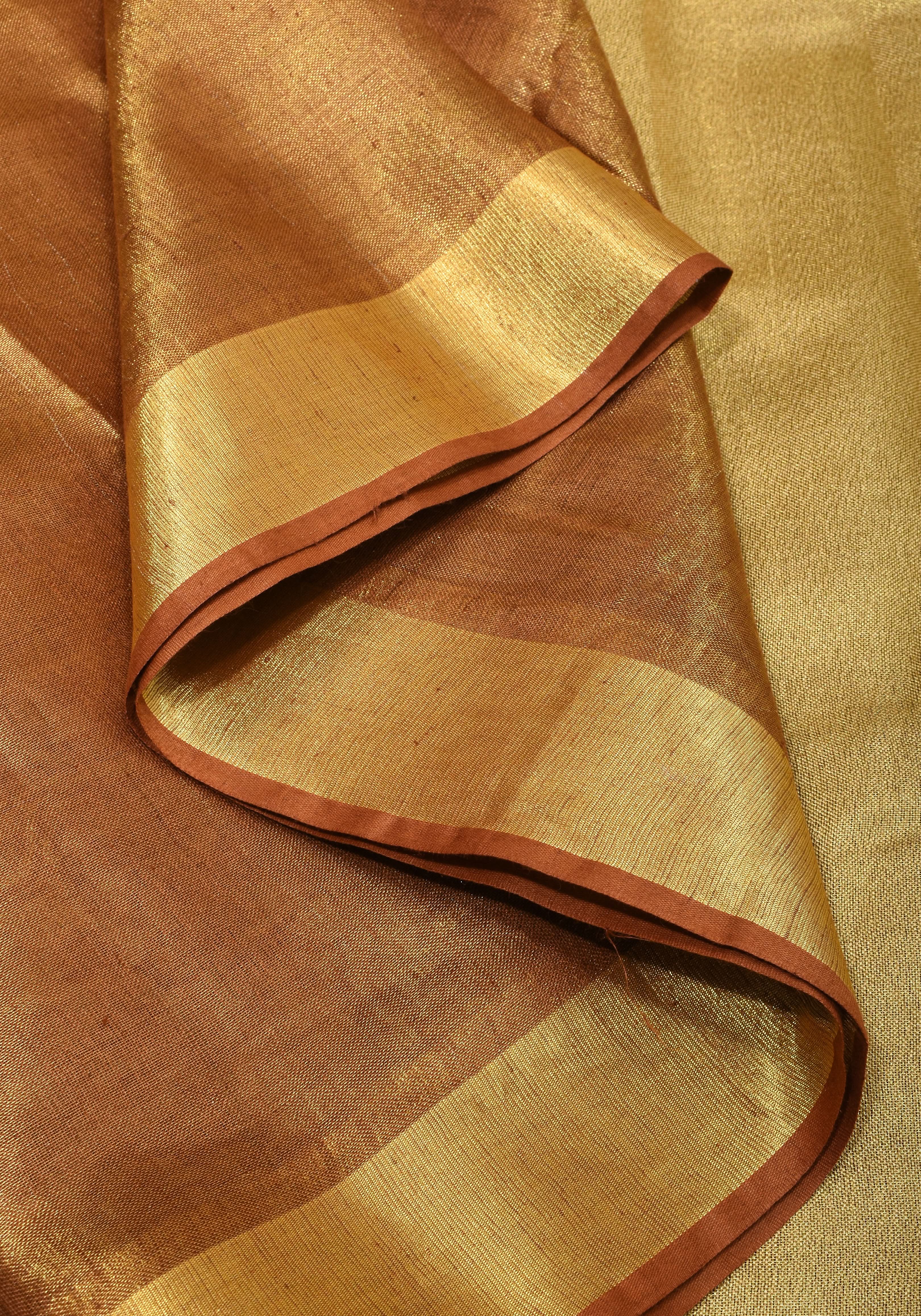 Caramel and Gold Tissue Linen Saree with Zari Border and long tassels | Shobitam