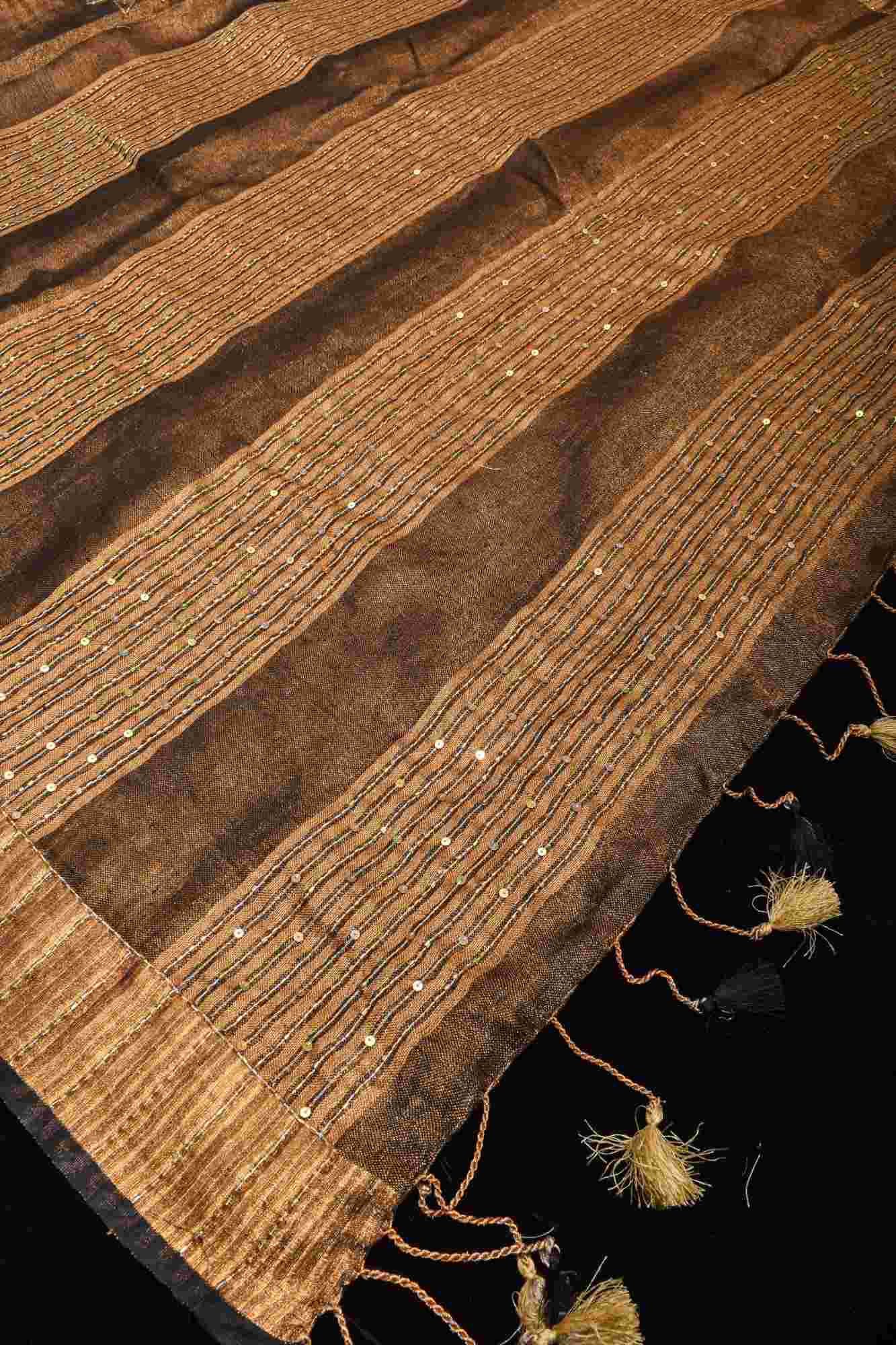 Embroidery cut dana with seqins Work Tissue Linen Saree in copper black with dramatic work Pallu
