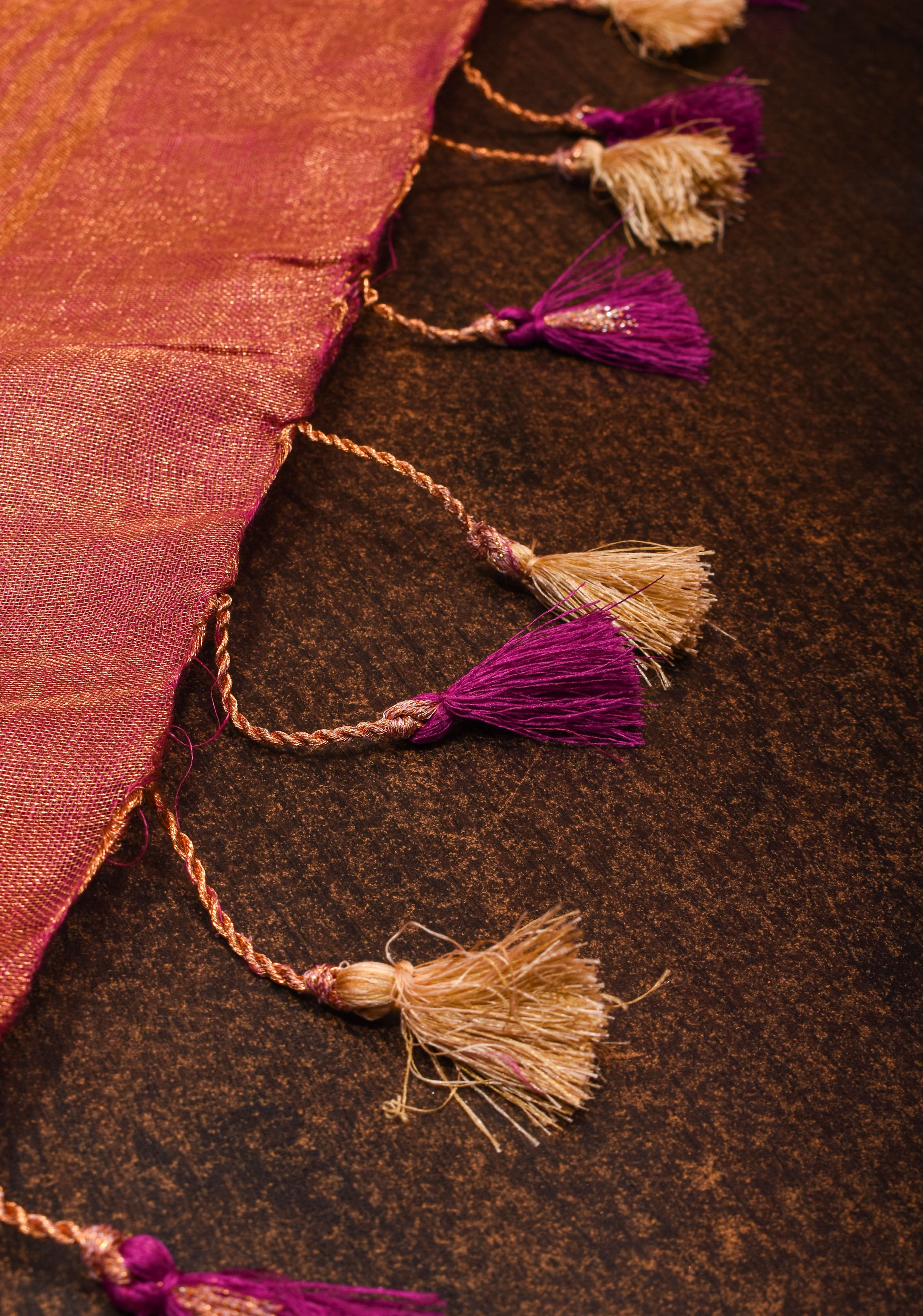 Tree Cutwork and Mirror Work Tissue Linen Saree in Magenta with pretty tassels | Shobitam