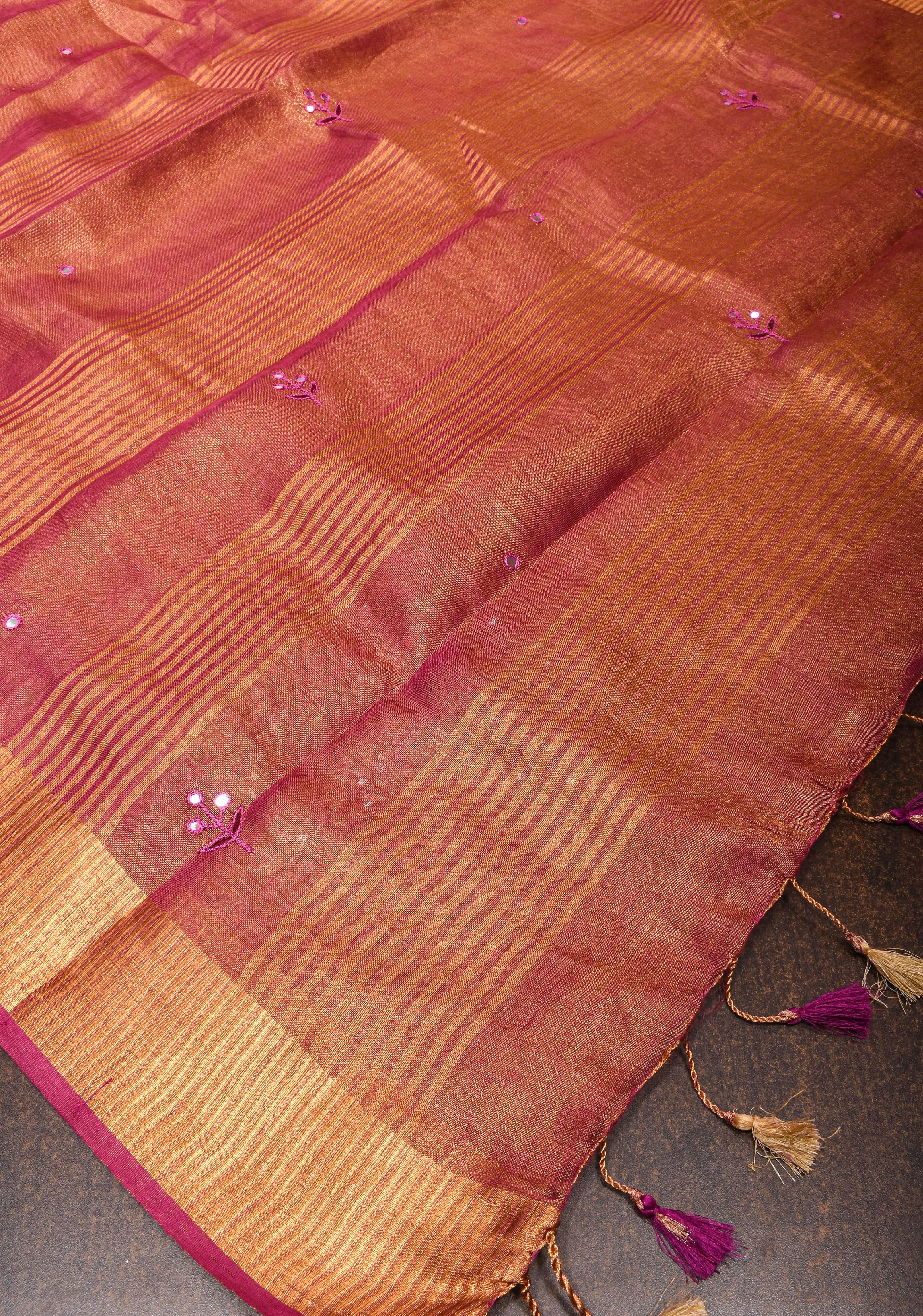Tree Cutwork and Mirror Work Tissue Linen Saree in Magenta with pretty tassels | Shobitam
