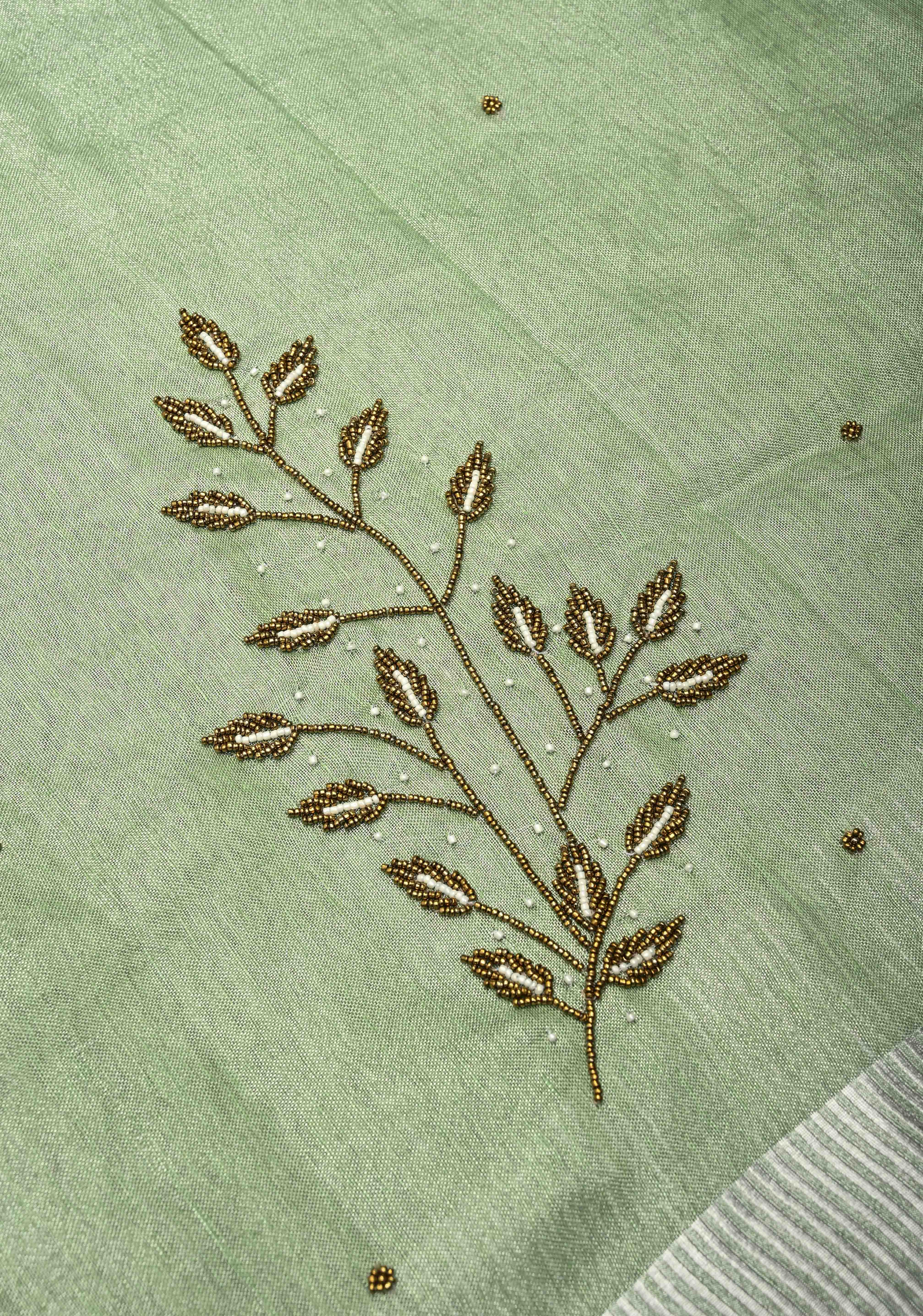 Hand Beadwork and Embroidery on Tissue Linen Saree in Sage Green and silver | Shobitam