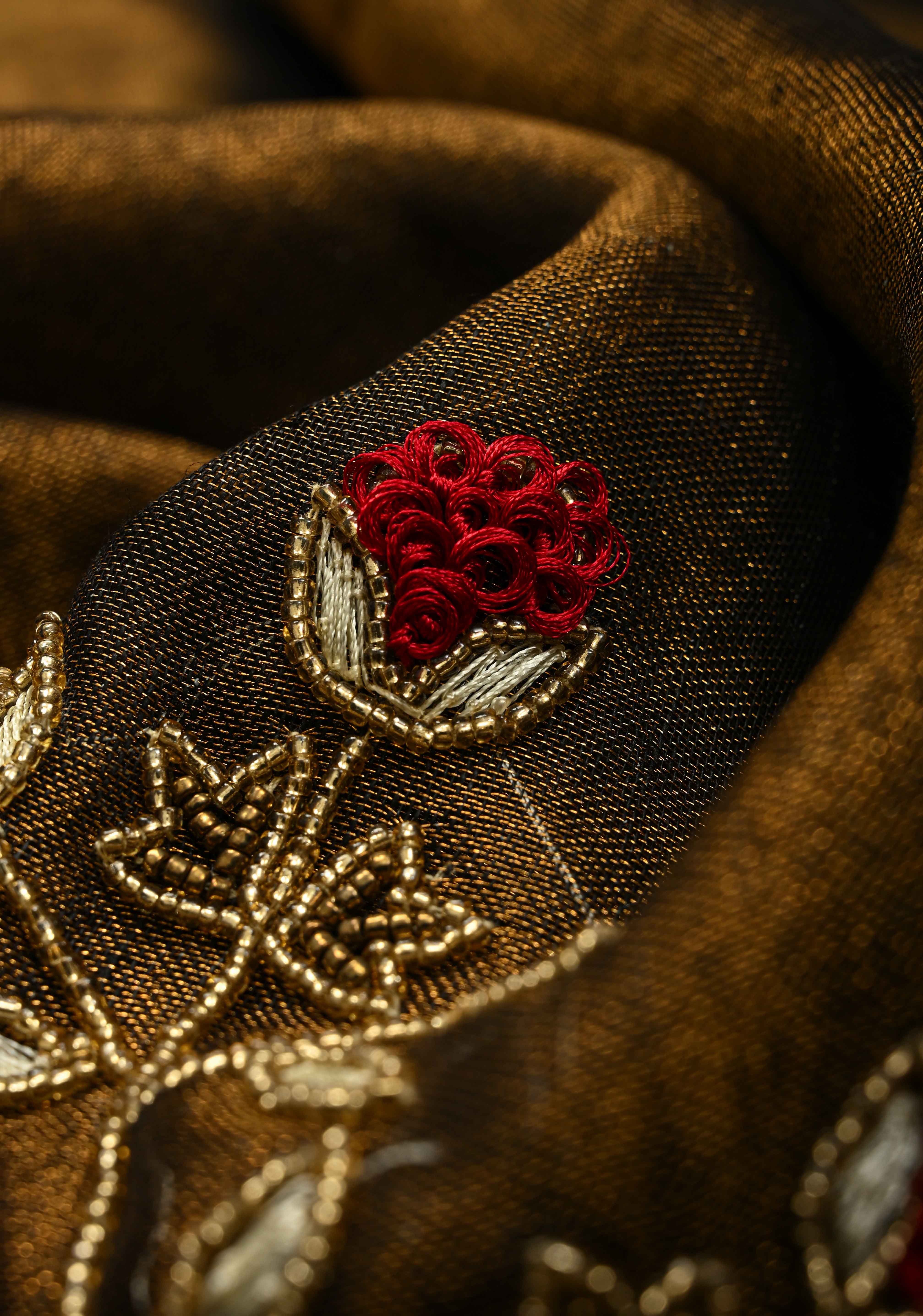 Hand Embroidery and Beadwork in copper and Black on Tissue Linen Saree | Shobitam