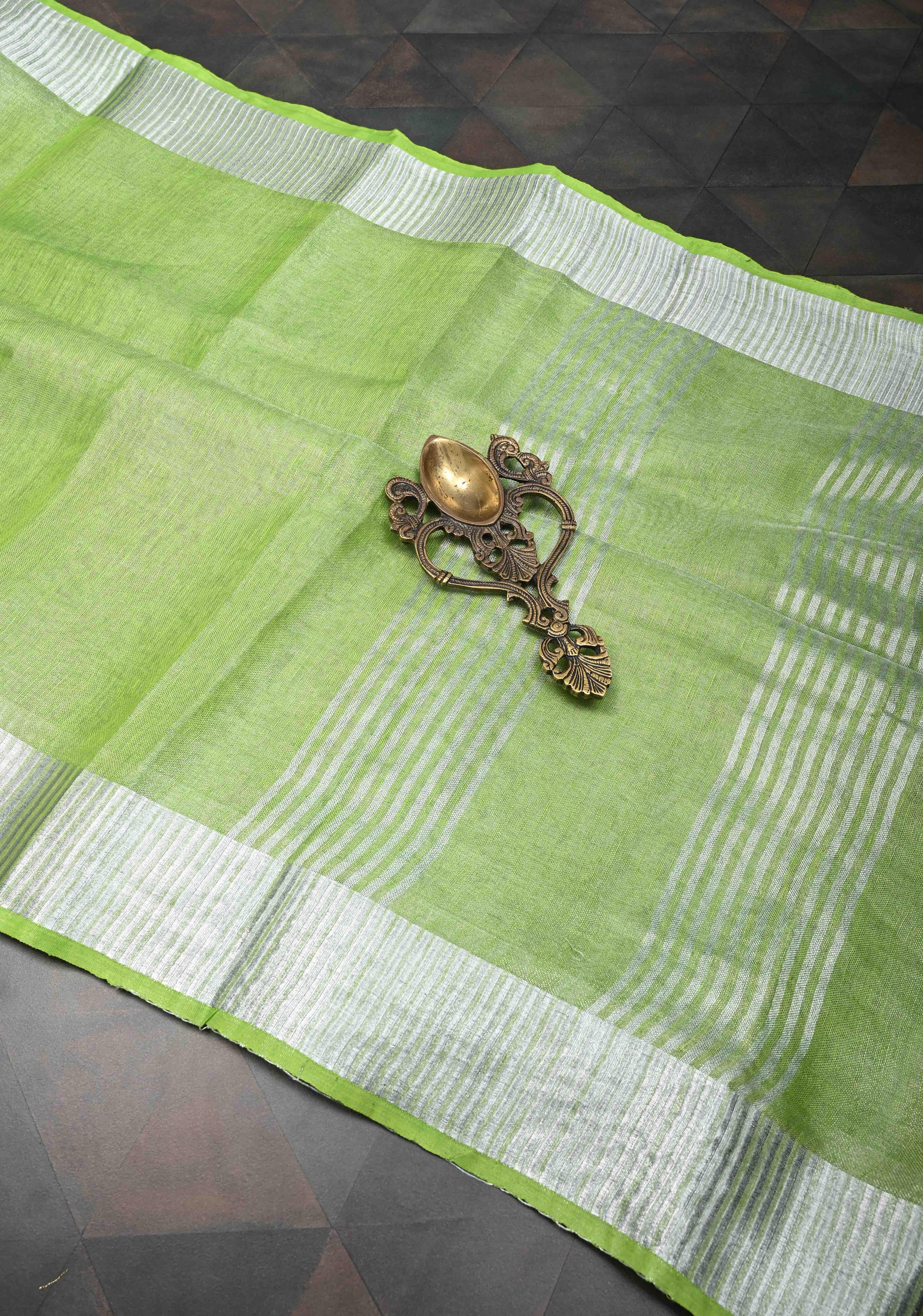 Light Green Tissue Linen Saree With Silver Zari Border | Shobitam