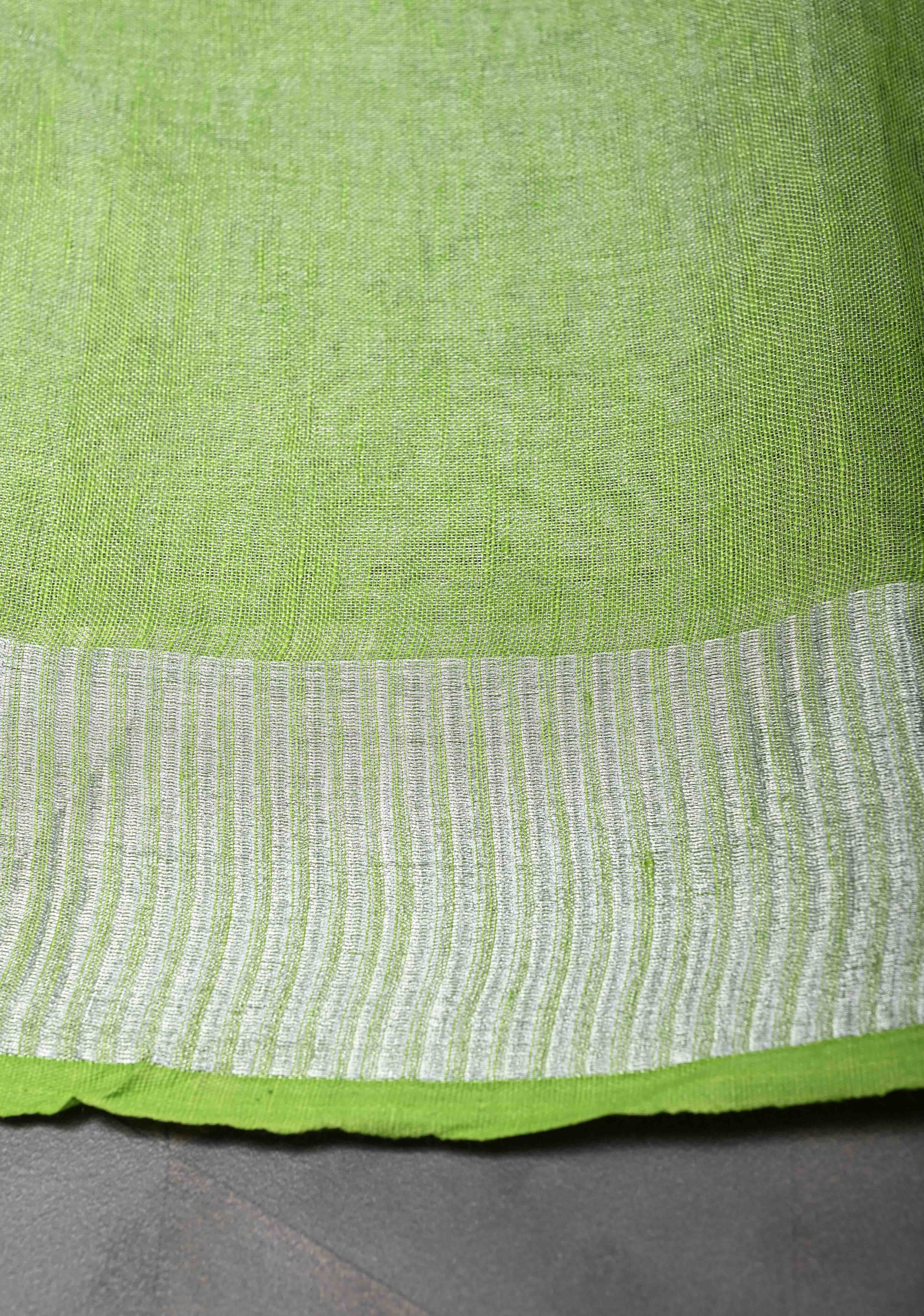 Light Green Tissue Linen Saree With Silver Zari Border | Shobitam