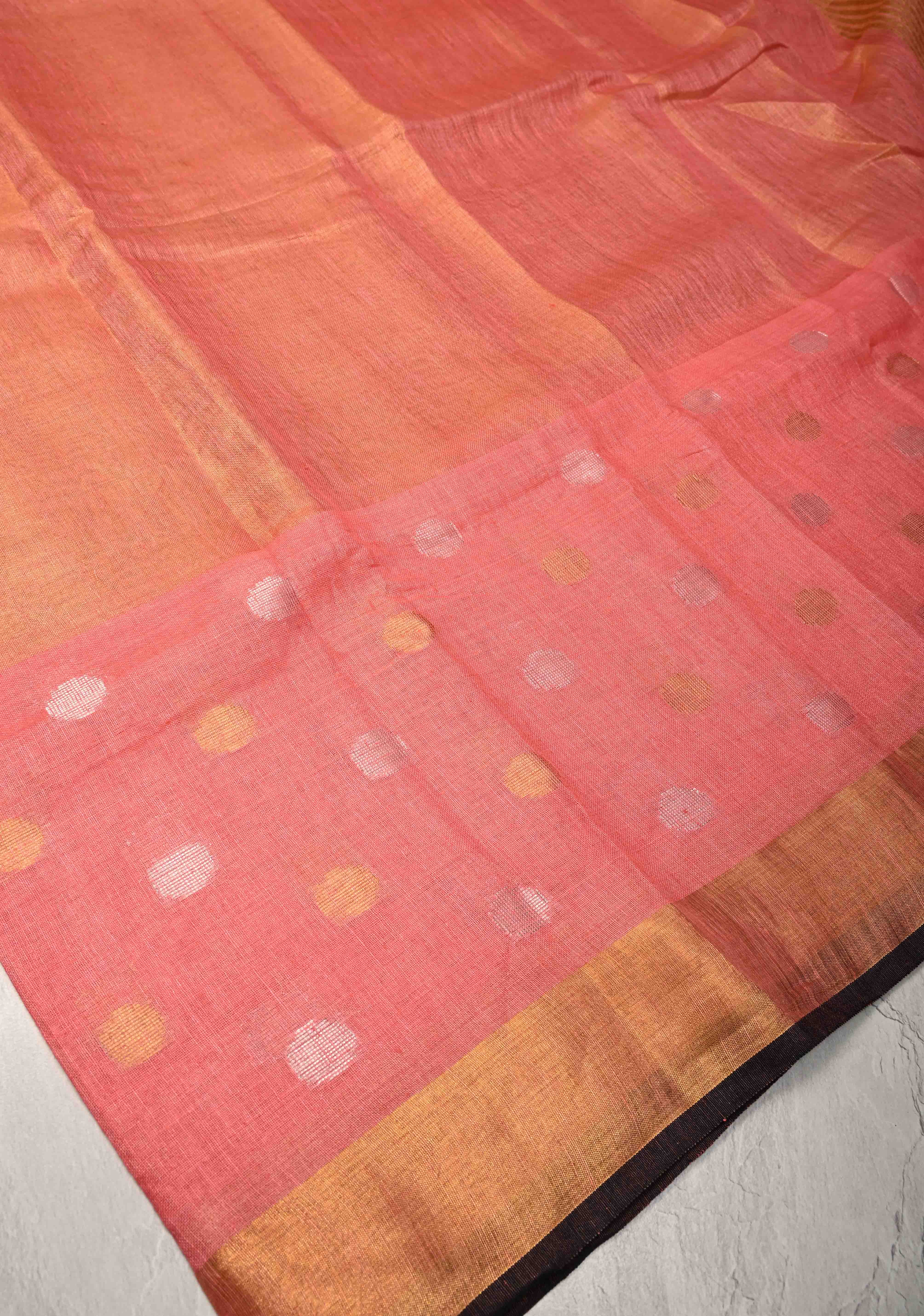 Salmon Pink Tissue Body Linen Saree in Muted Antique Gold with Sona Rupa Polka Dots Skirt Border | Shobitam