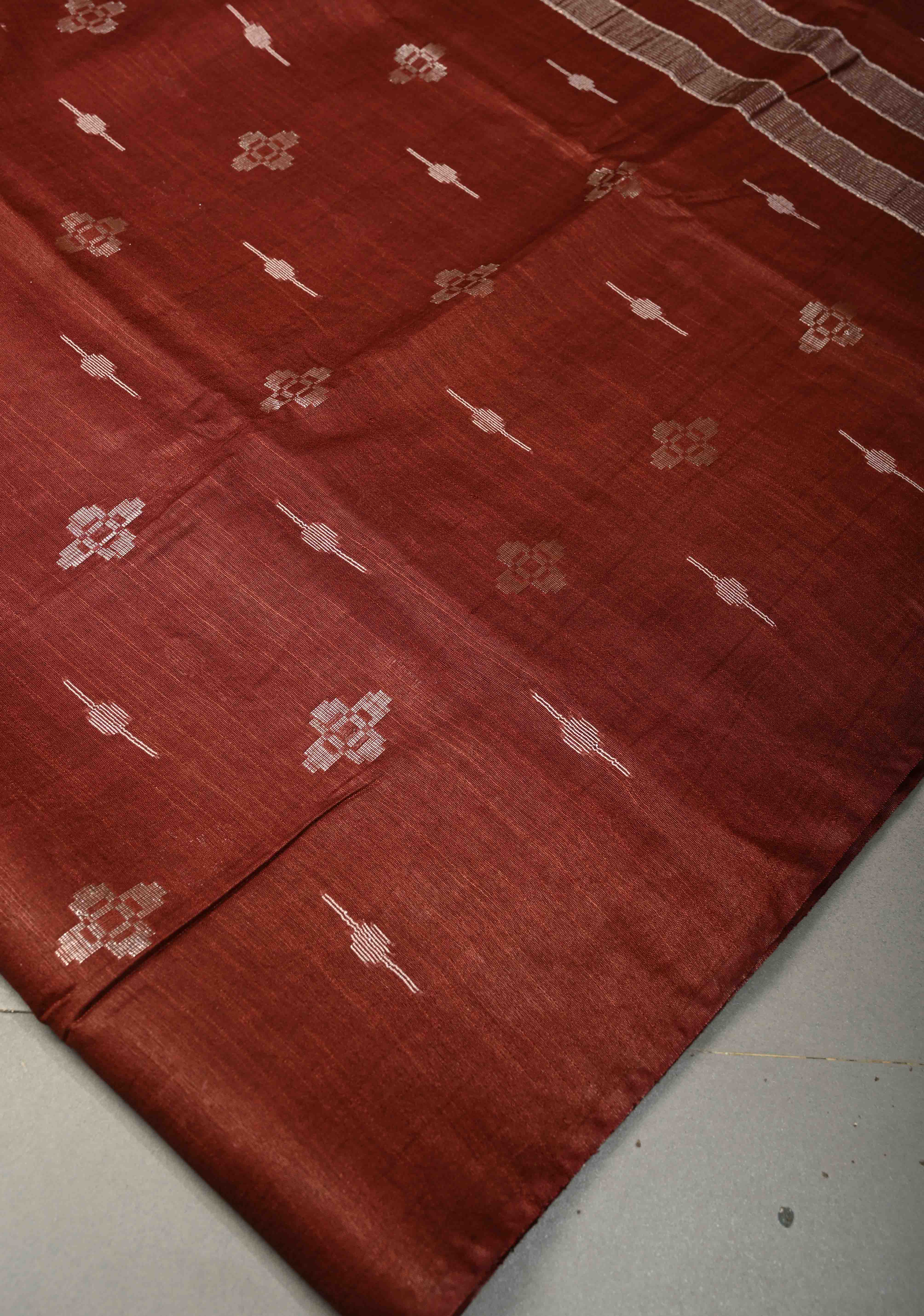 Deep Maroon Borderless Semi Tussar Saree with Thread and Muted Zari Buttas | Shobitam