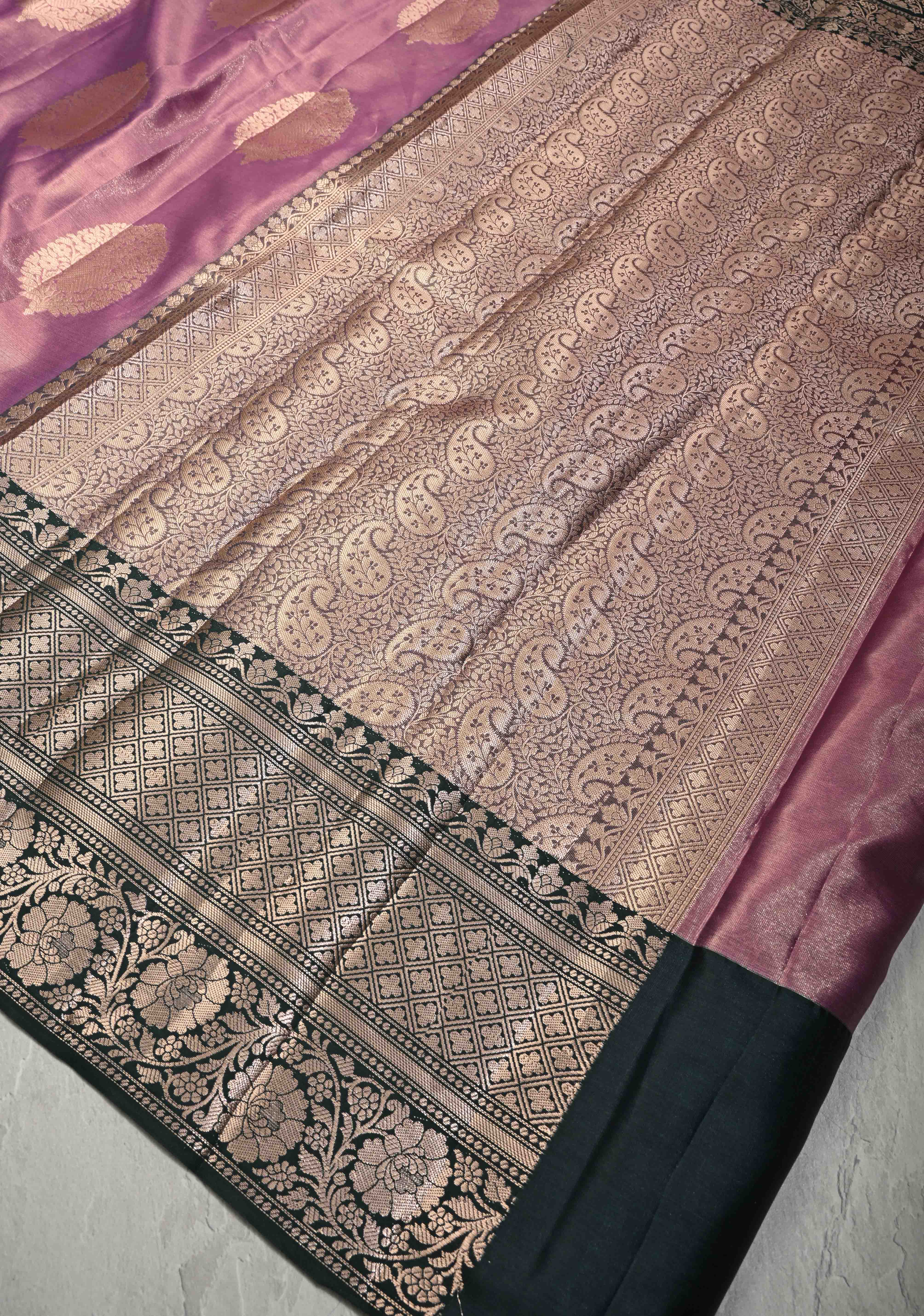 Mauve Pink Tissue Kanjivaram Semi Silk Saree with Floral Buttas and Dark Green wide Border | Shobitam