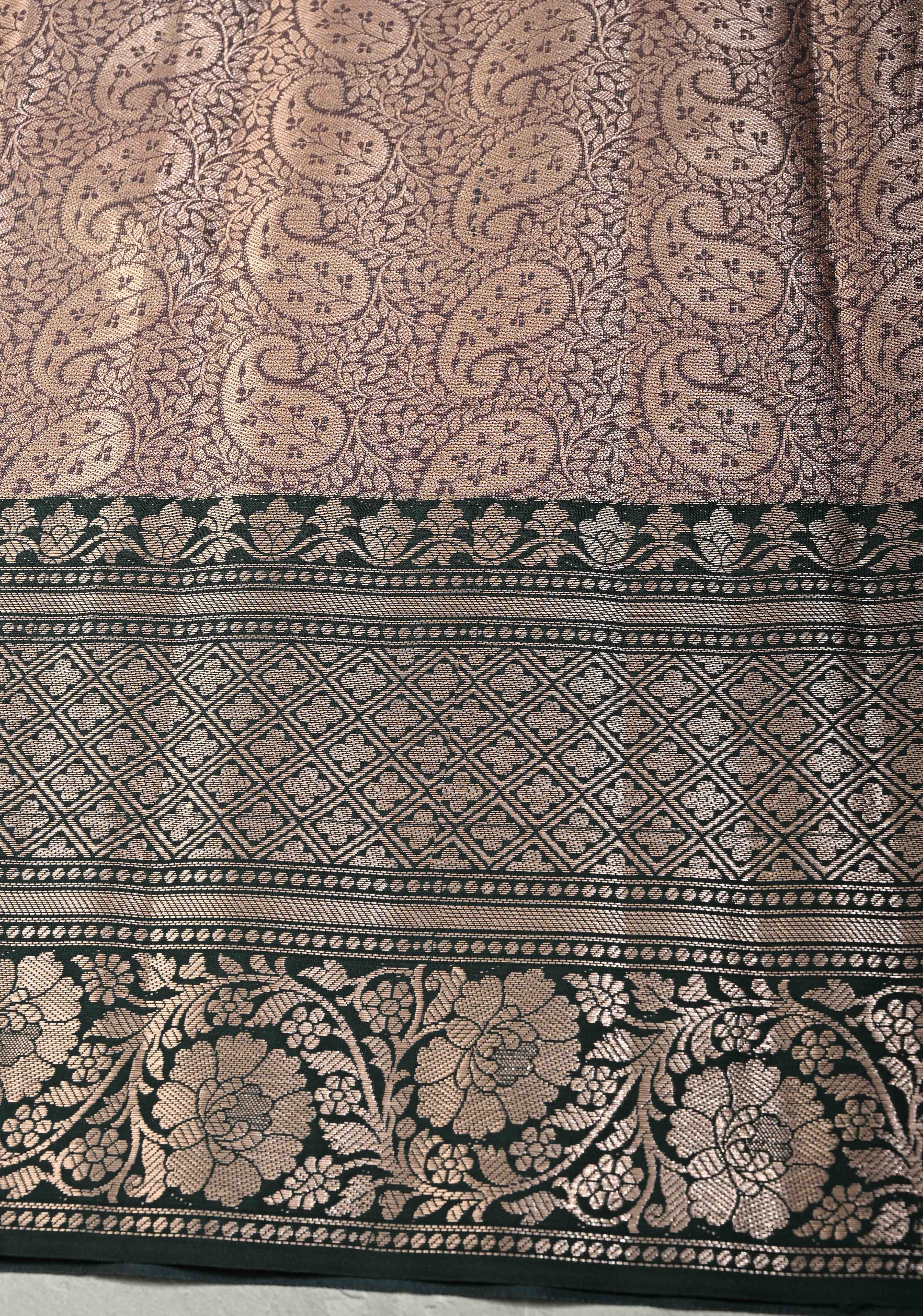 Mauve Pink Tissue Kanjivaram Semi Silk Saree with Floral Buttas and Dark Green wide Border | Shobitam