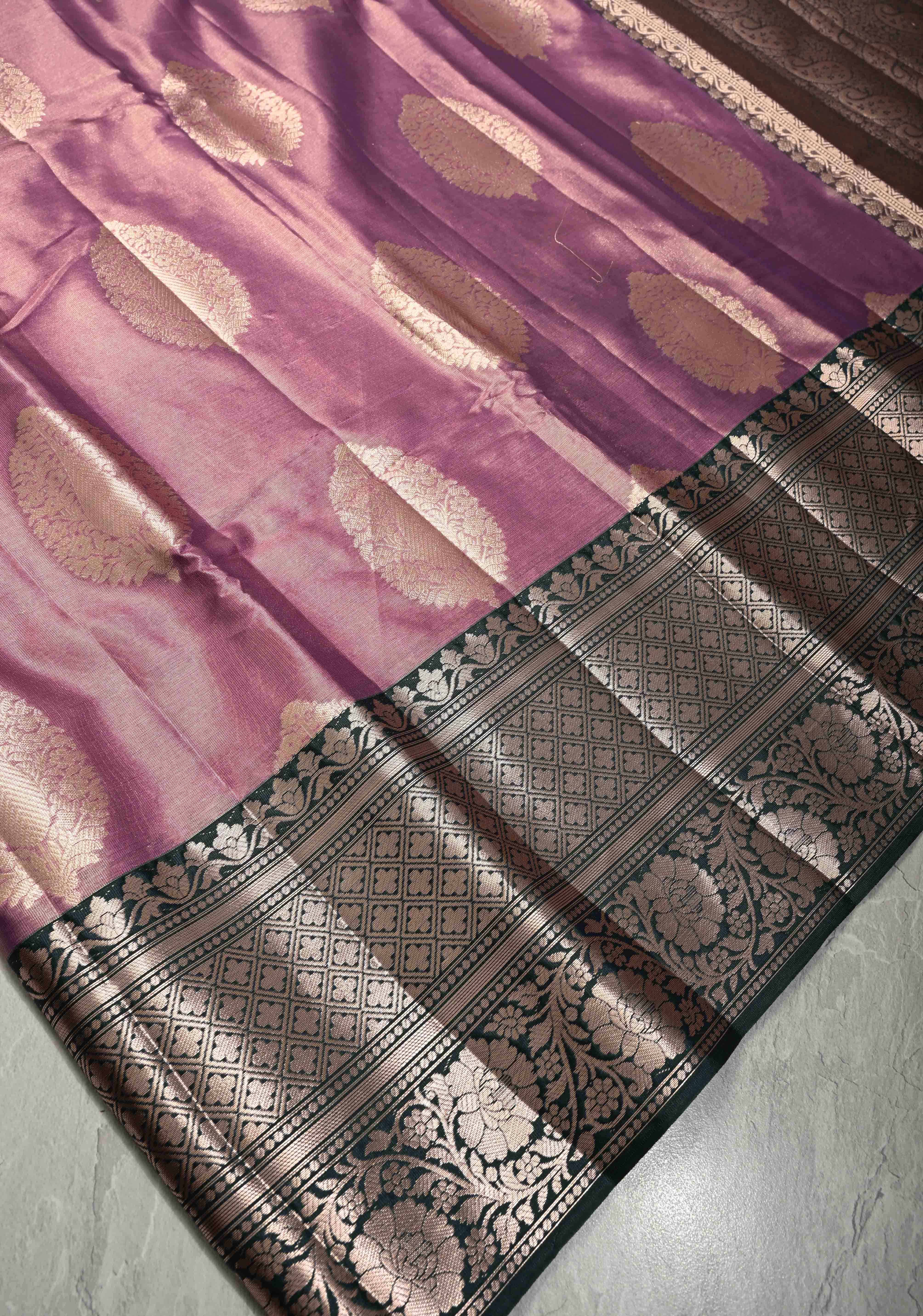 Mauve Pink Tissue Kanjivaram Semi Silk Saree with Floral Buttas and Dark Green wide Border | Shobitam