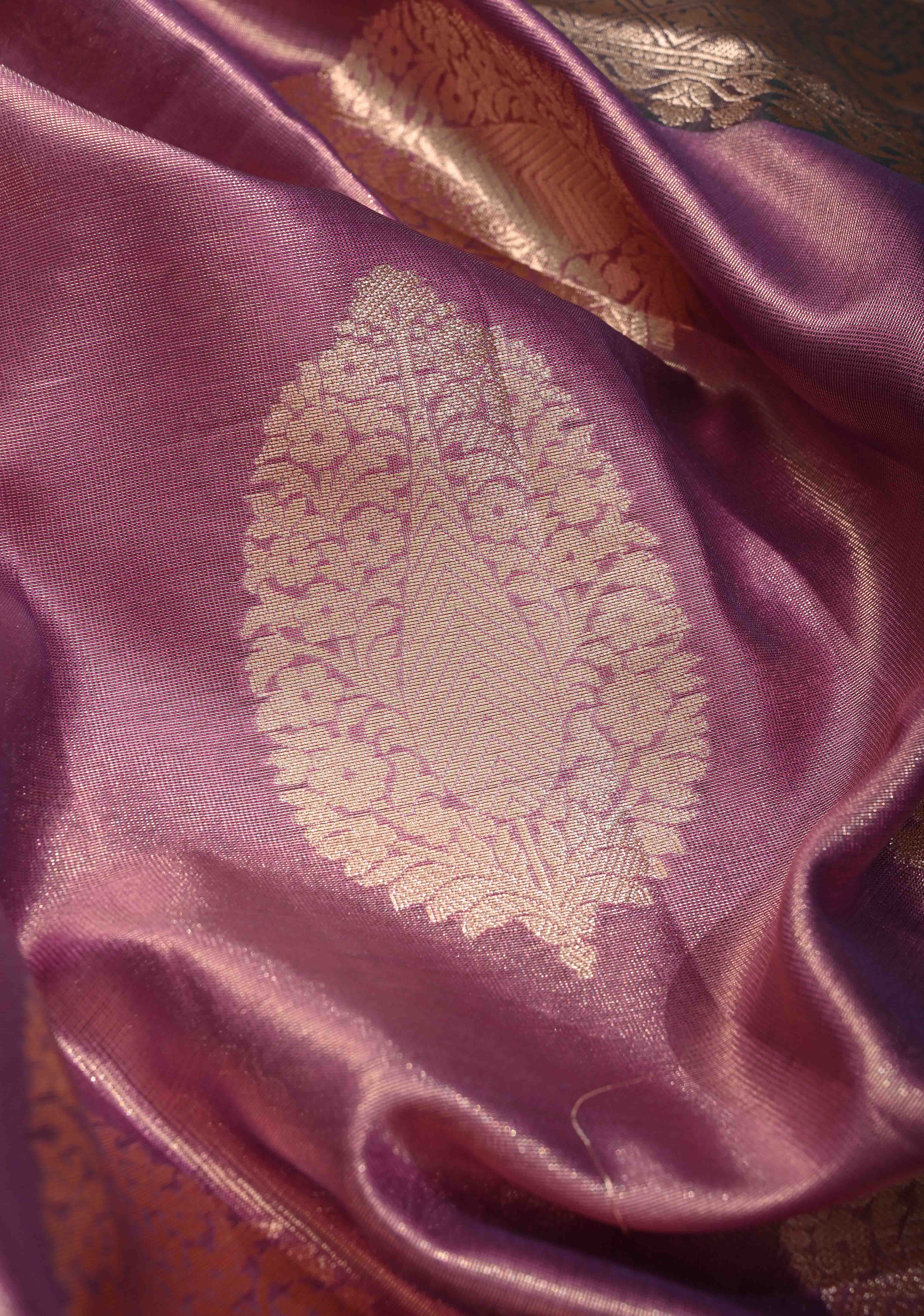 Mauve Pink Tissue Kanjivaram Semi Silk Saree with Floral Buttas and Dark Green wide Border | Shobitam