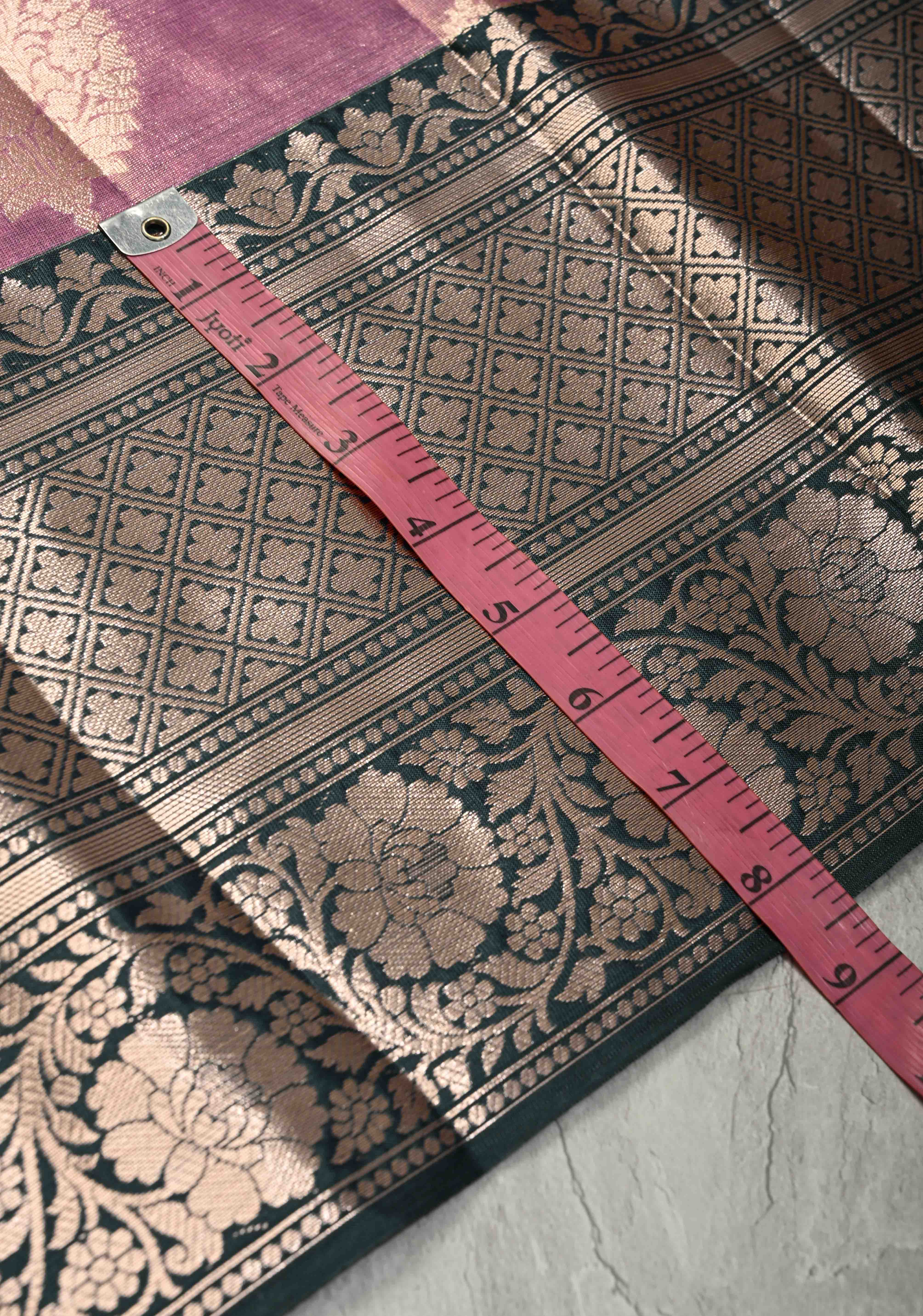 Mauve Pink Tissue Kanjivaram Semi Silk Saree with Floral Buttas and Dark Green wide Border | Shobitam