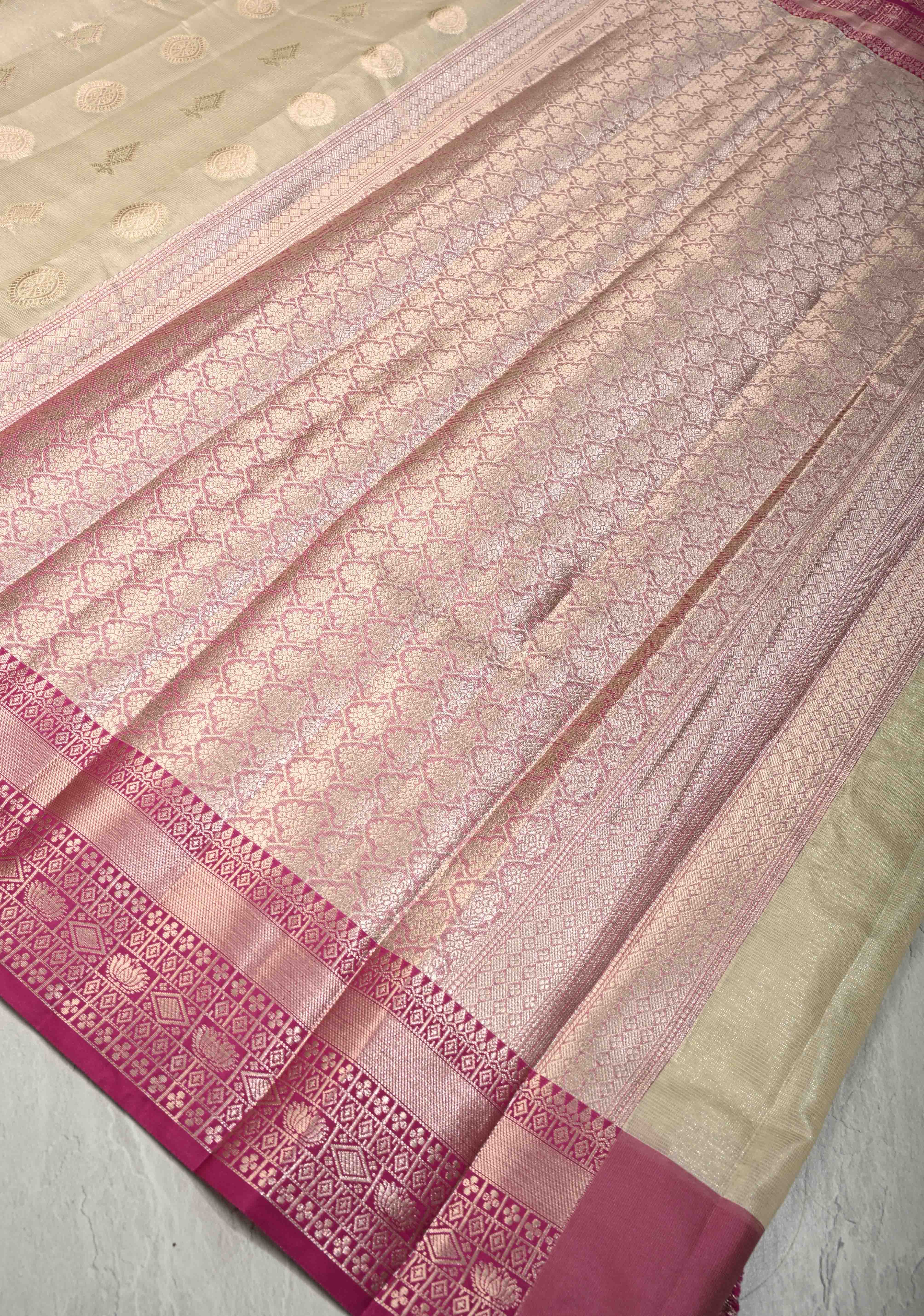 Creamy Green Kanjivaram Tissue Semi Silk Saree with Zari Buttas and Contrast Zari Border | Shobitam