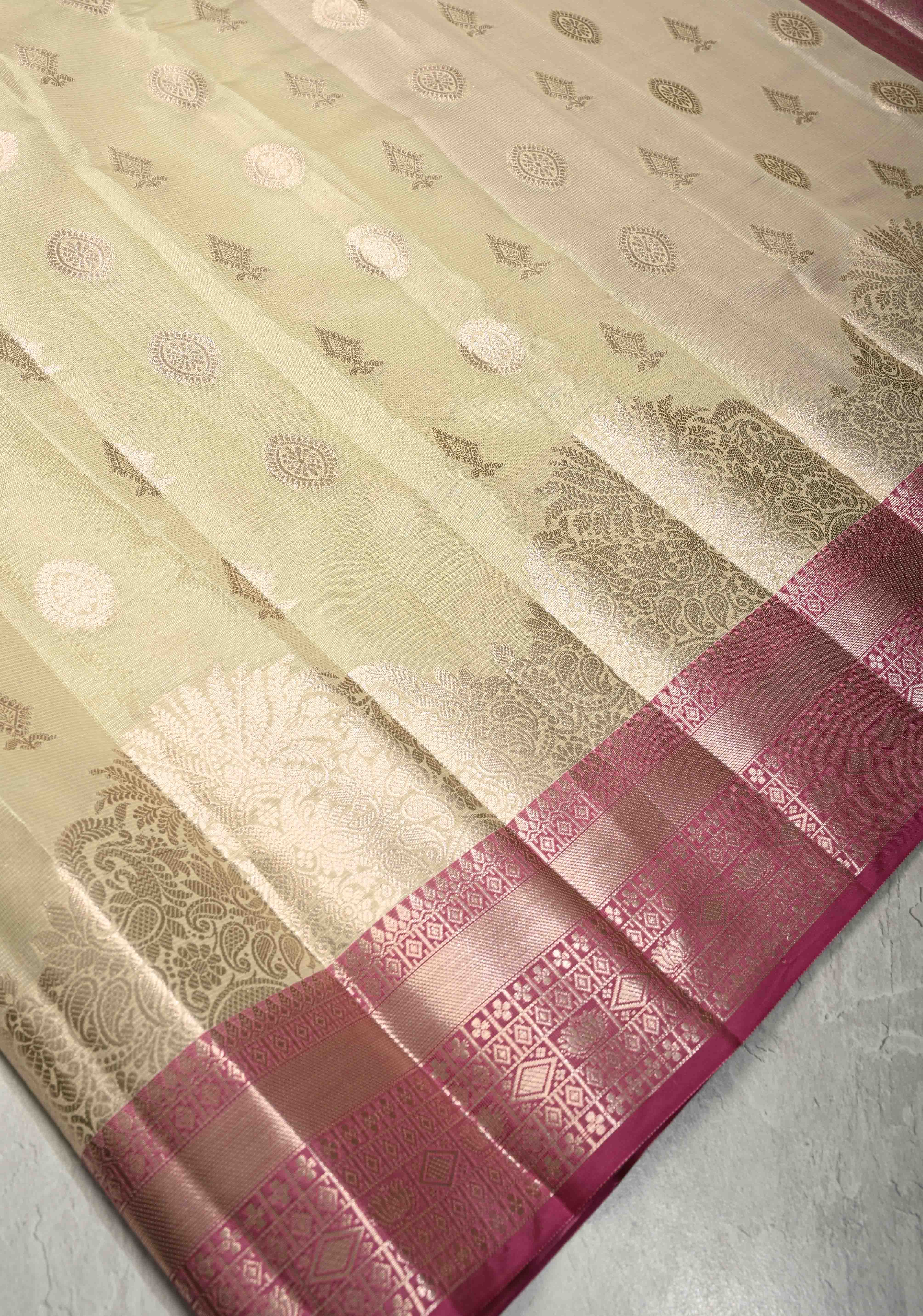 Creamy Green Kanjivaram Tissue Semi Silk Saree with Zari Buttas and Contrast Zari Border | Shobitam