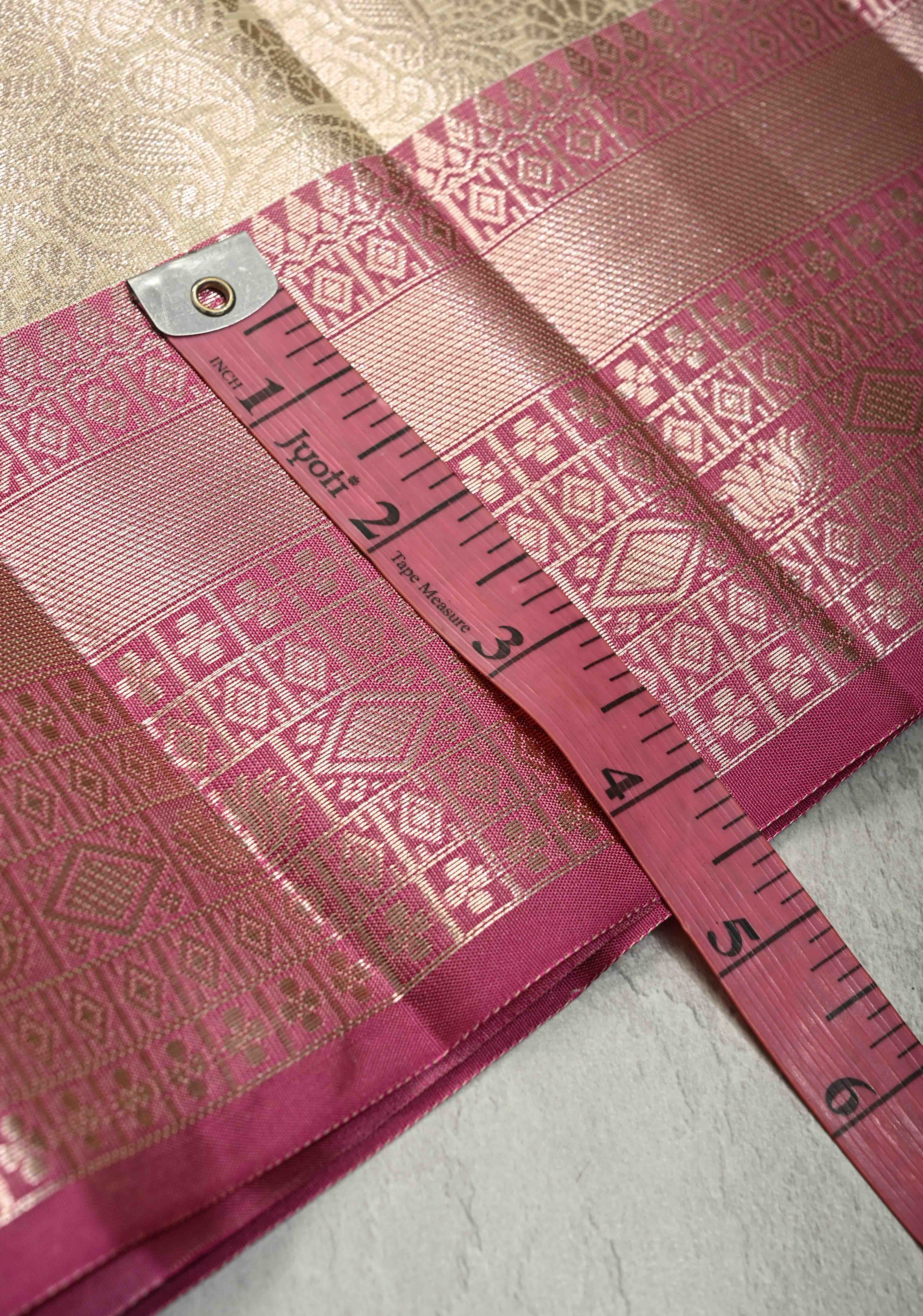 Creamy Green Kanjivaram Tissue Semi Silk Saree with Zari Buttas and Contrast Zari Border | Shobitam