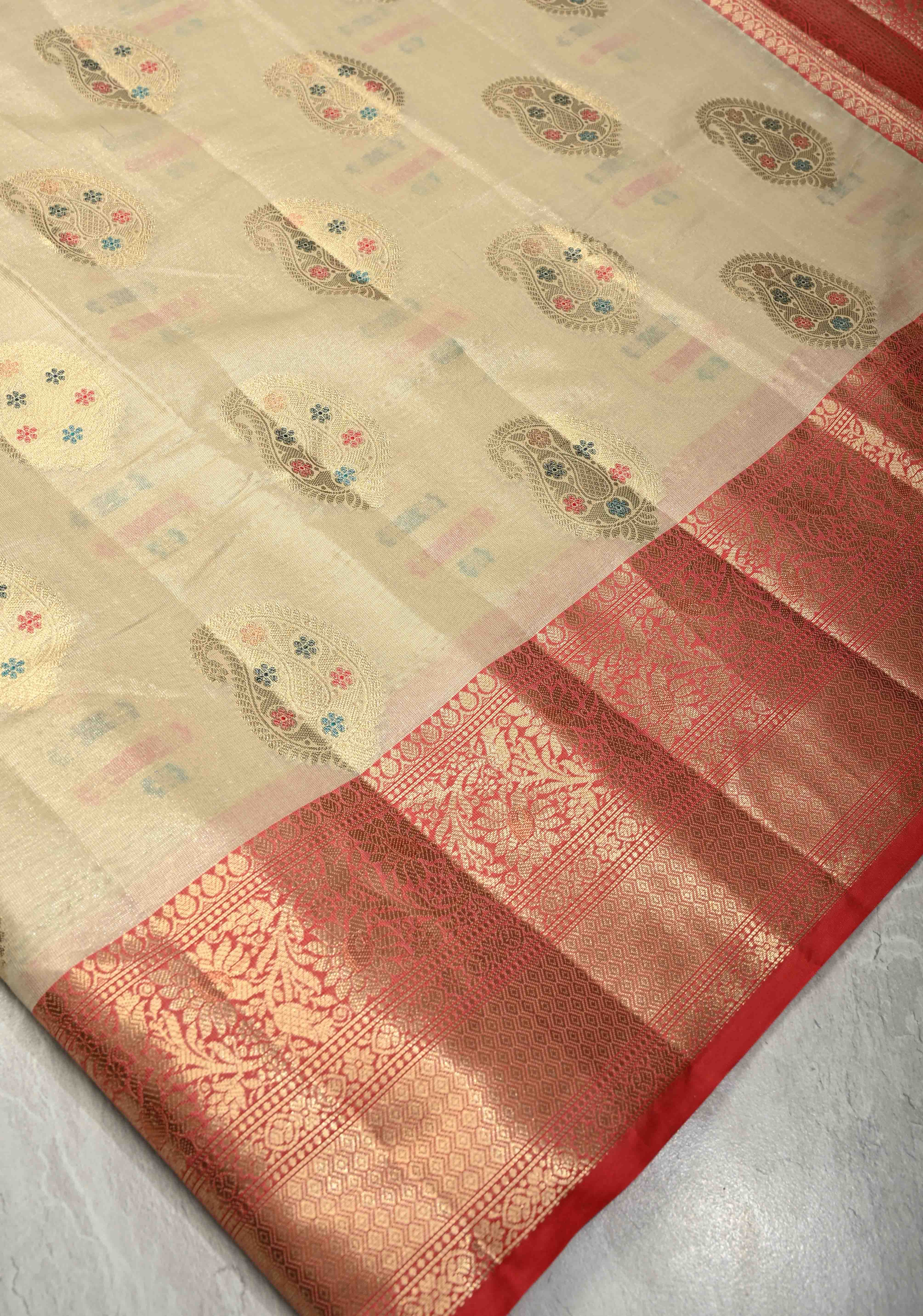 Beige Kanjivaram Tissue Semi Silk Saree with Meenakari Paisley Buttas and Contrast Zari Border | Shobitam