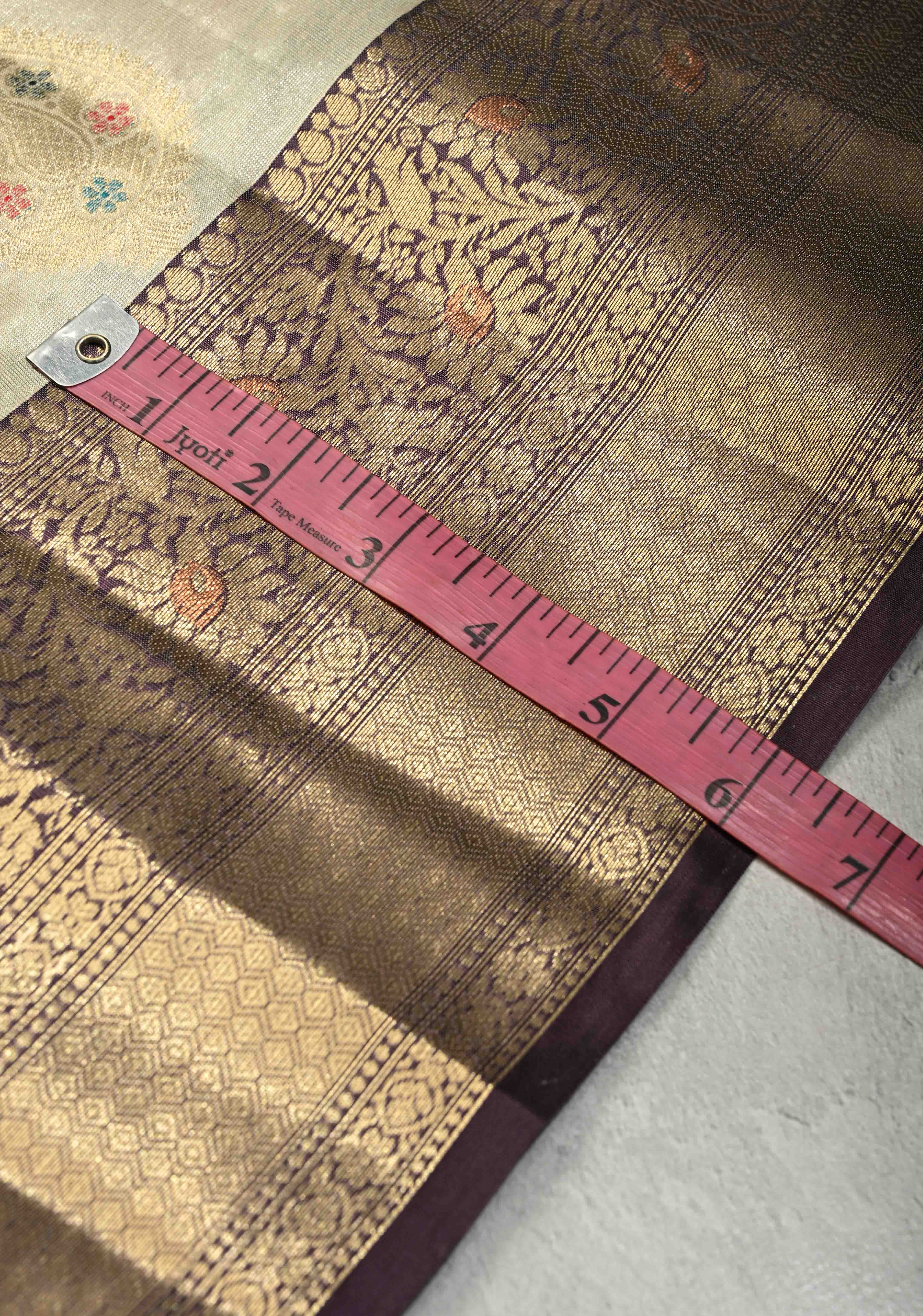 Cream Kanjivaram Tissue Semi Silk Saree with Meenakari Paisley Zari Buttas and Contrast Zari Border | Shobitam