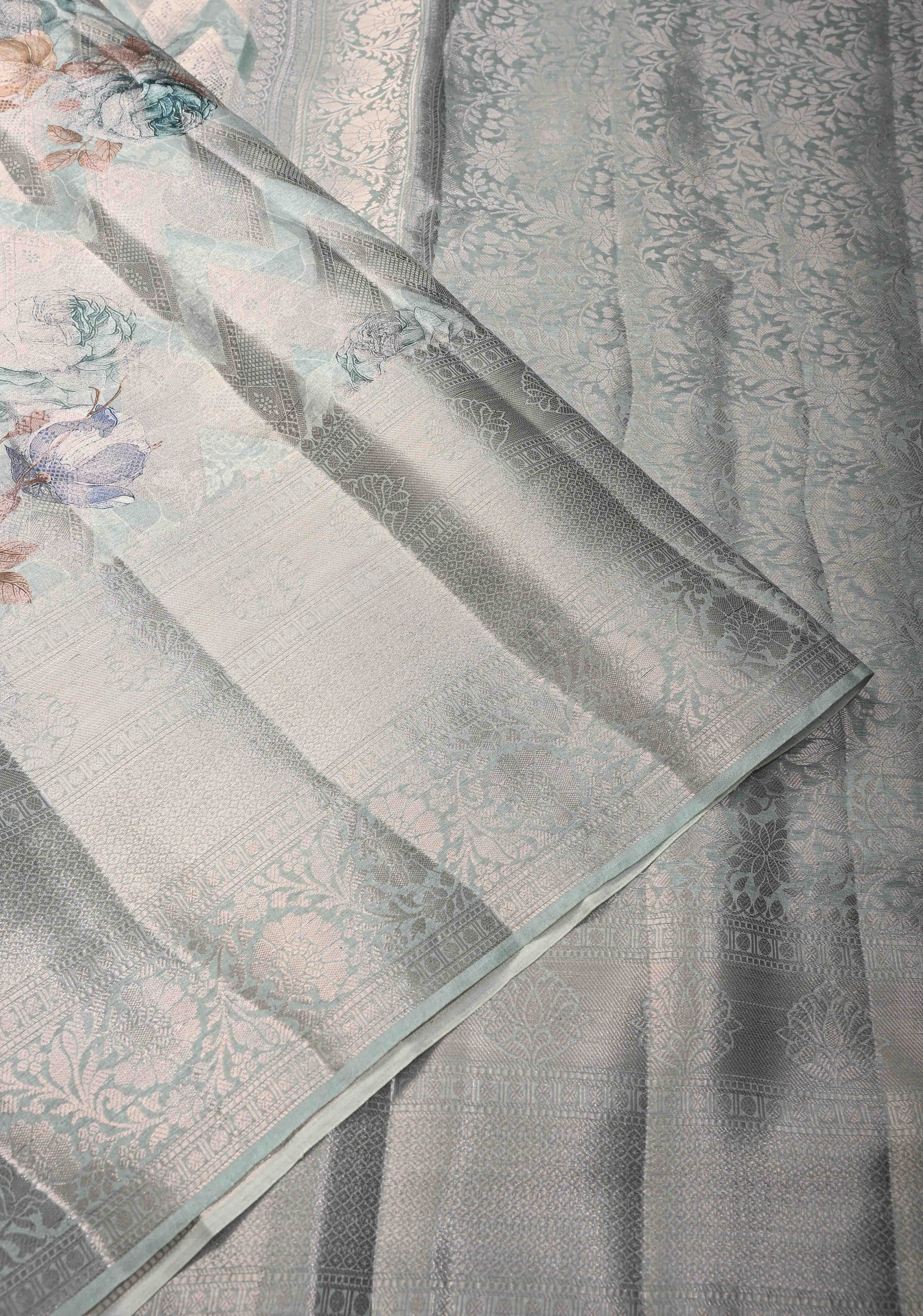 Pastel Sage Green Floral Digital Print on Banarasi Semi Silk Saree with Muted Zari Chevron Design and Wide Zari Border | Shobitam