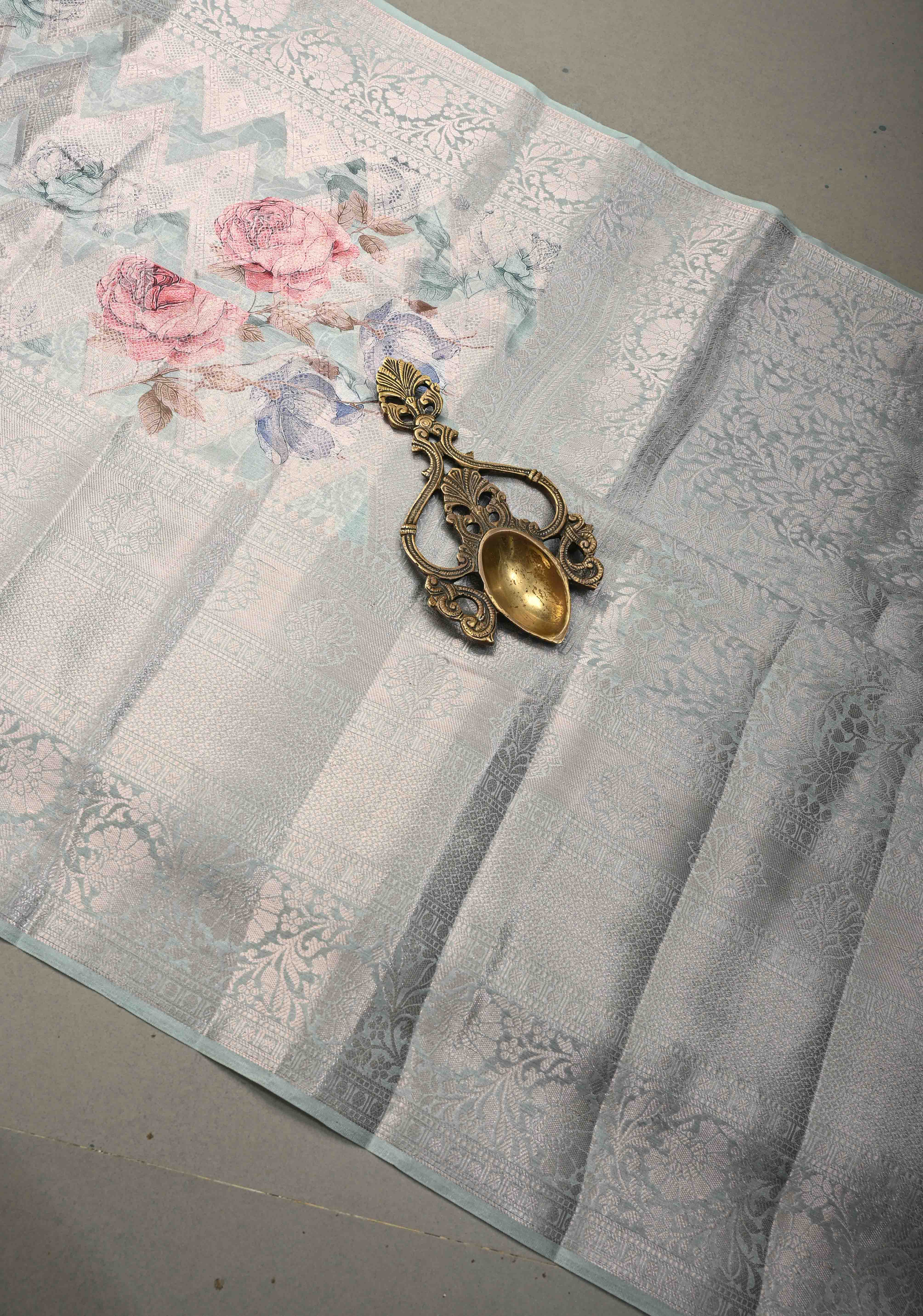 Pastel Sage Green Floral Digital Print on Banarasi Semi Silk Saree with Muted Zari Chevron Design and Wide Zari Border | Shobitam