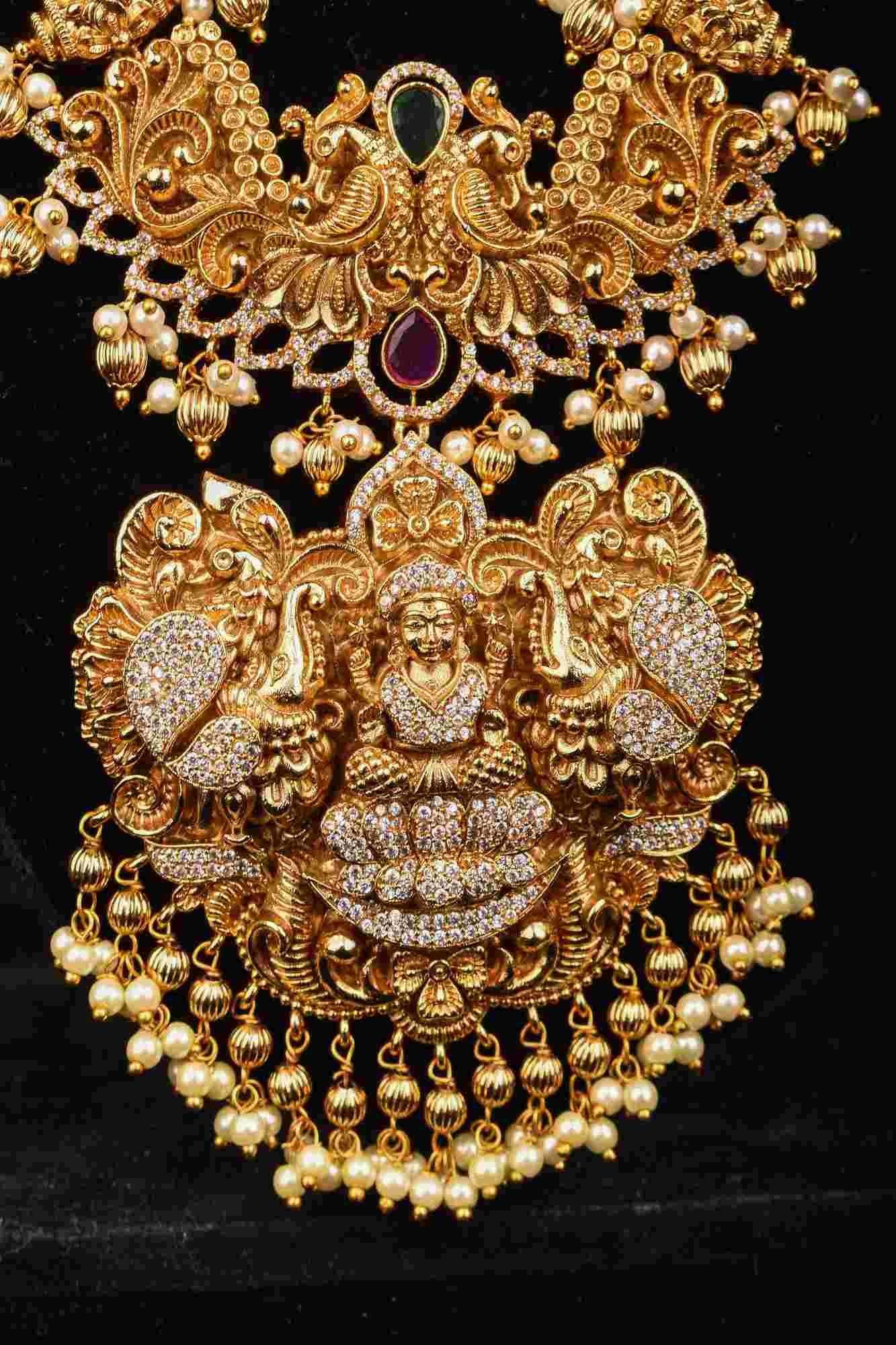Stunning Antique Gold Finish Temple Necklace Set with Goddess Lakshmi Pendant and Pearl Embellishments