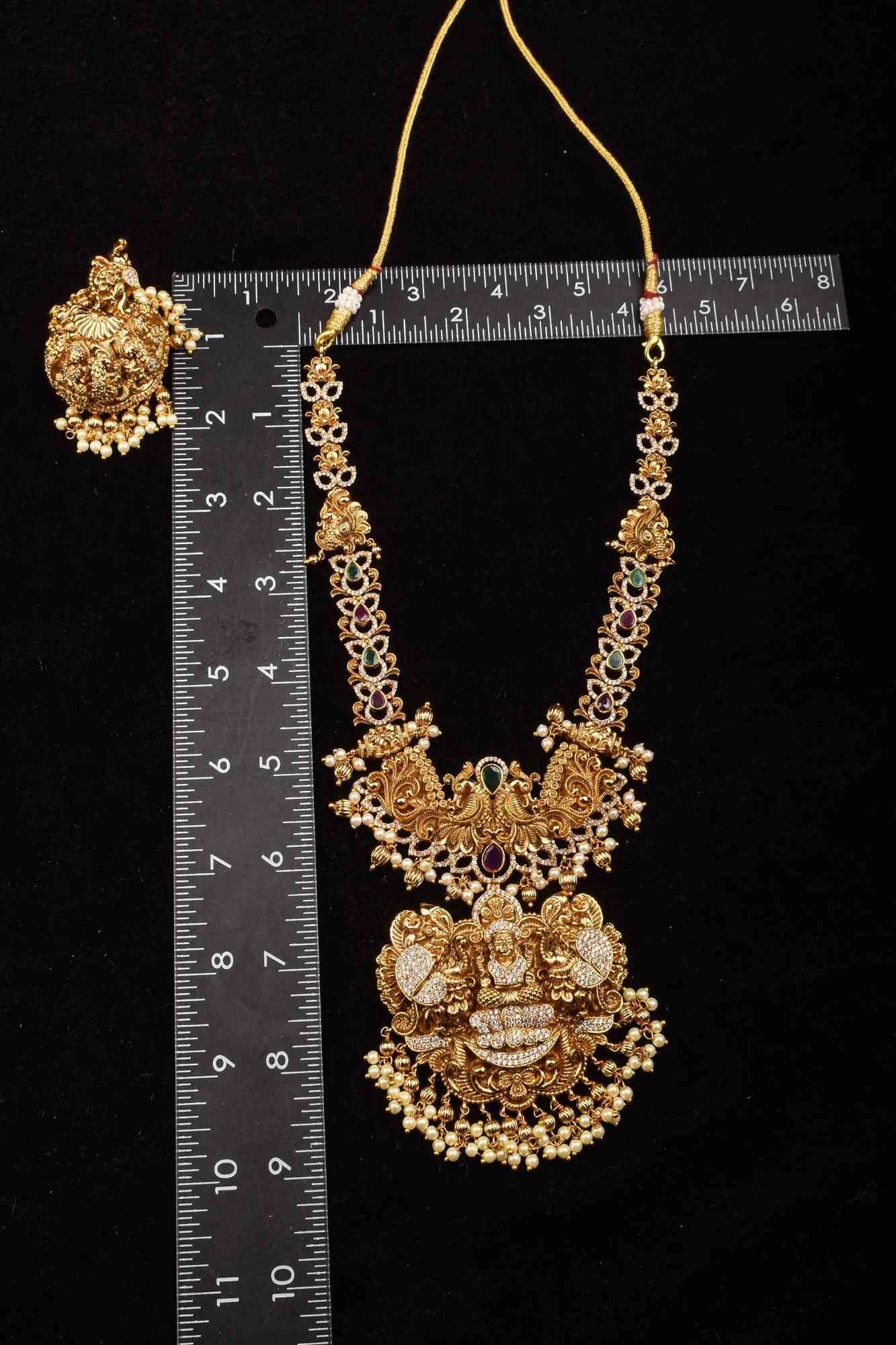 Stunning Antique Gold Finish Temple Necklace Set with Goddess Lakshmi Pendant and Pearl Embellishments