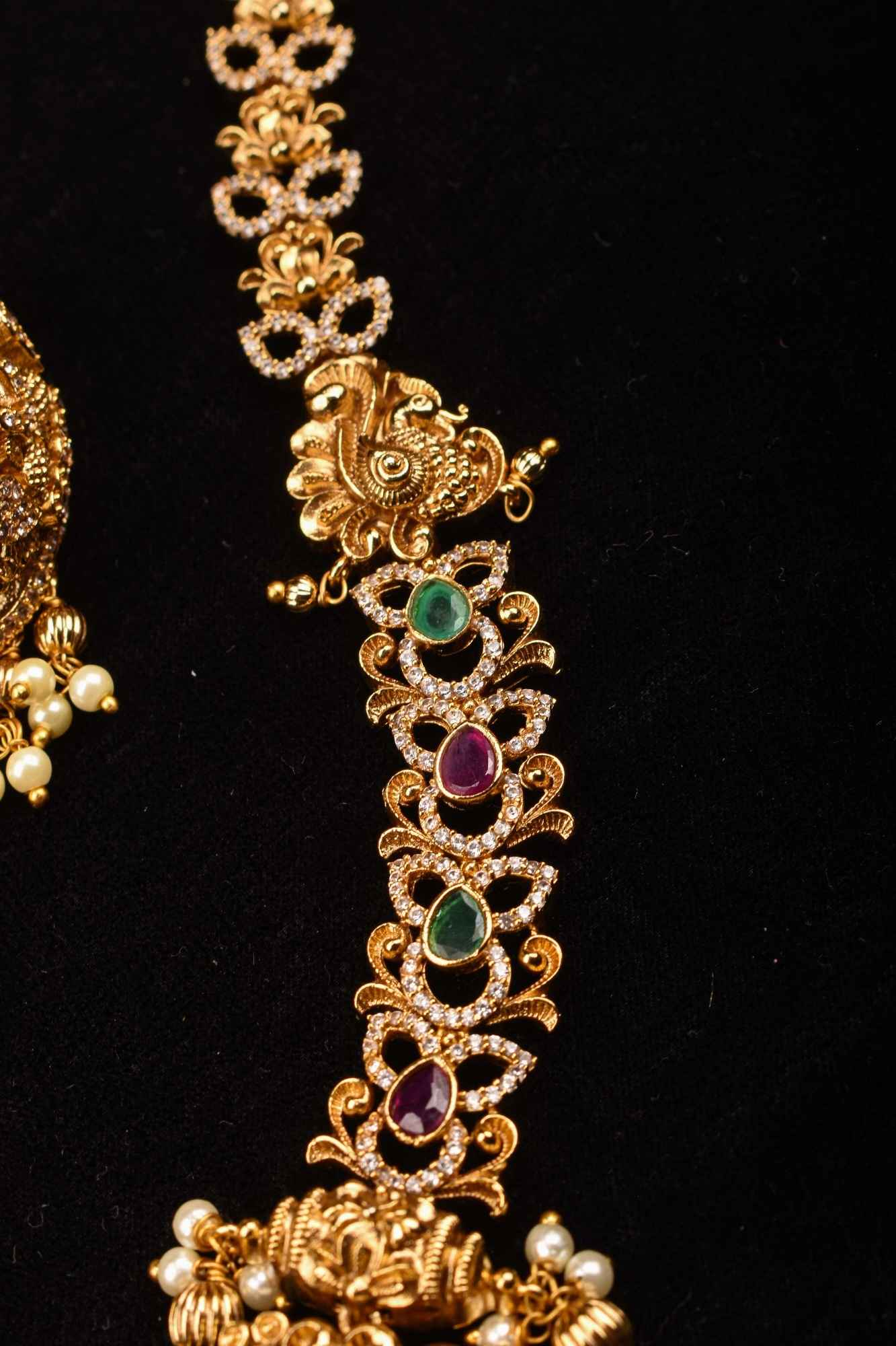 Stunning Antique Gold Finish Temple Necklace Set with Goddess Lakshmi Pendant and Pearl Embellishments
