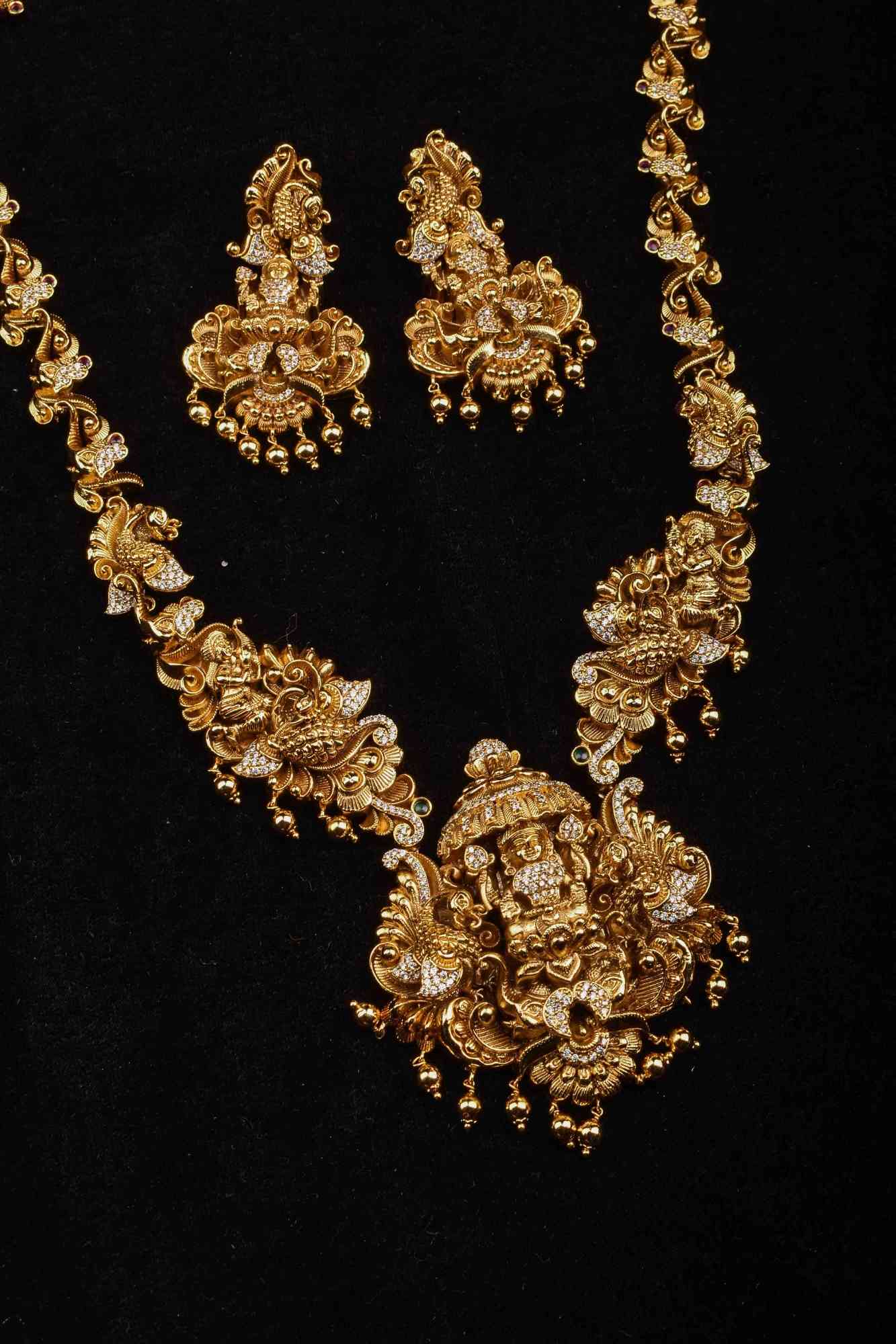 Antique Mid-Haram Set with 3D Lakshmi and Peacock Motifs