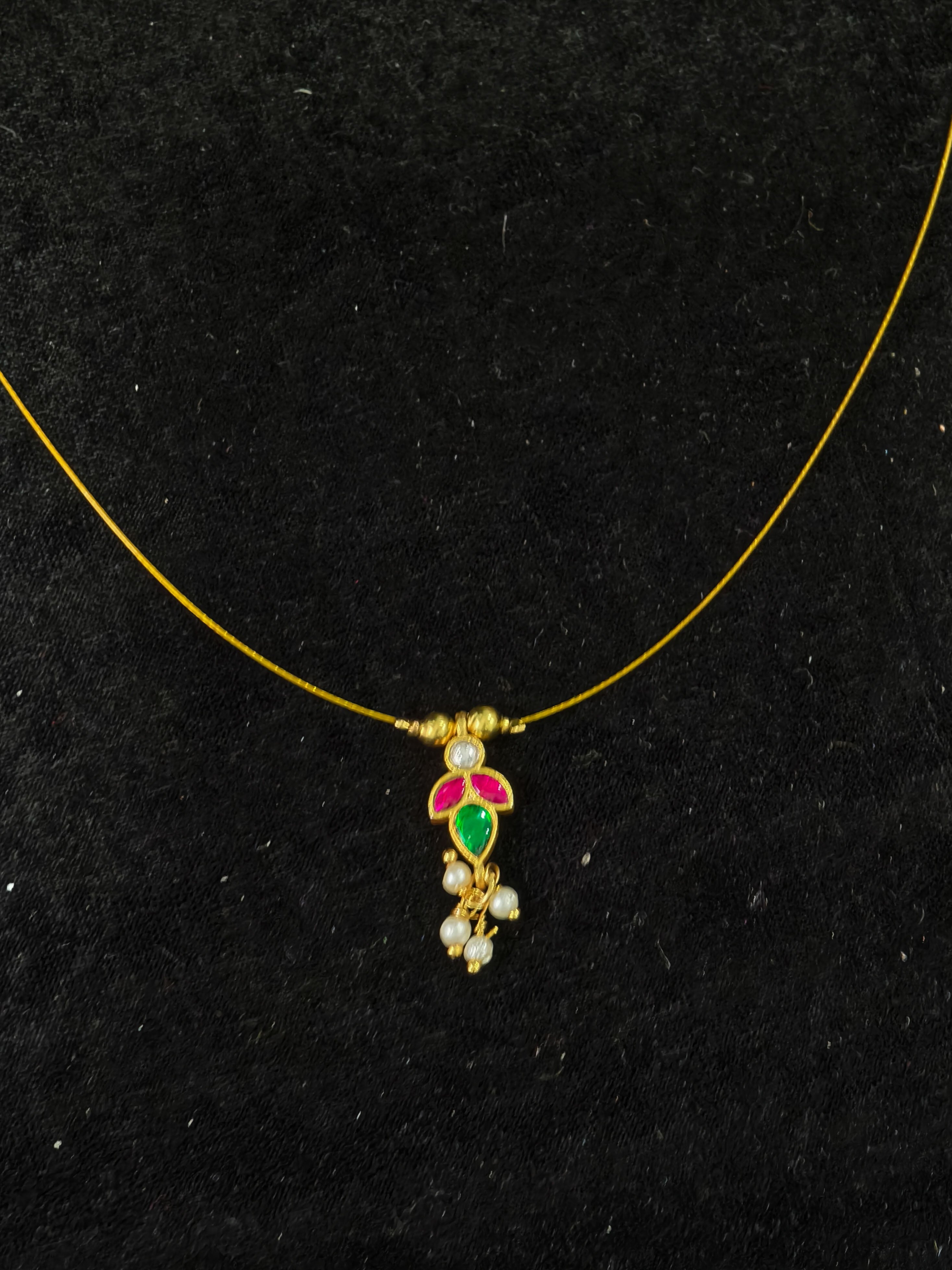 Invisible wire design with Floral Pendant and Jadau Green,Pink Stone | SHOBITAM