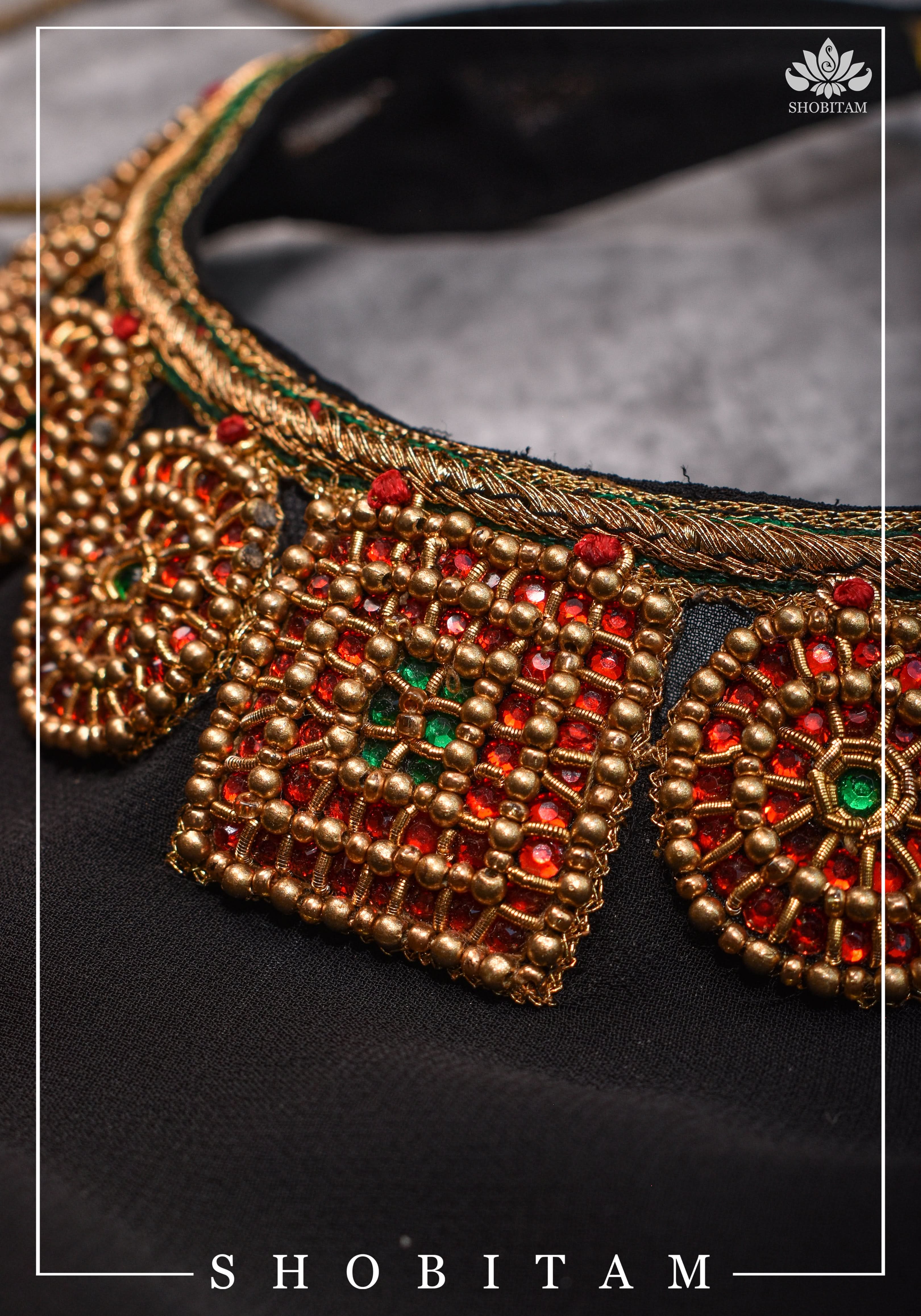 Made to order: Necklace Design Jadau Ornamental Blouse with Georgette Yoke in Black | Shobitam